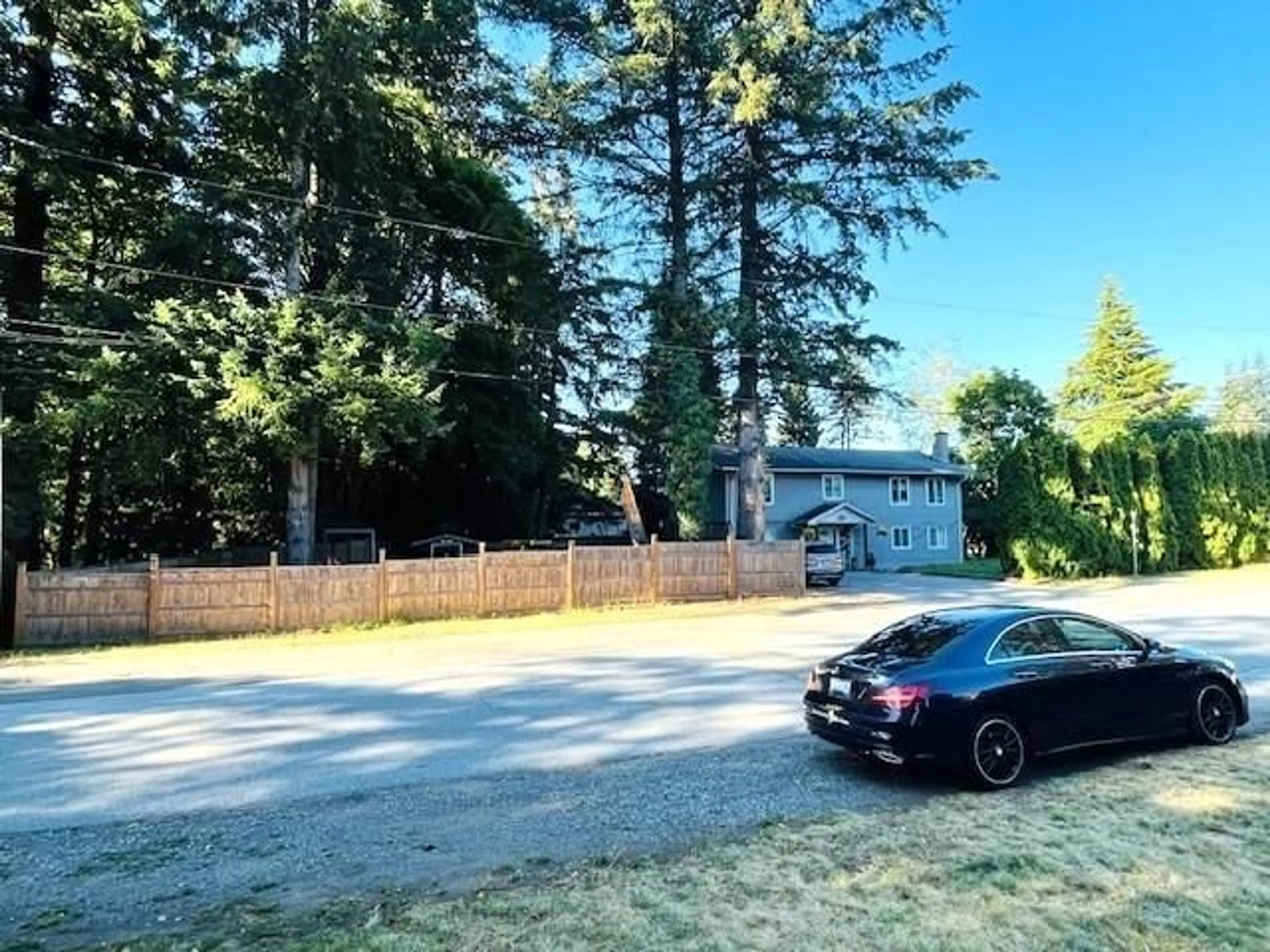 Frontside or backside of a home, the fenced backyard for 7857 140 STREET, Surrey British Columbia V3W5K5