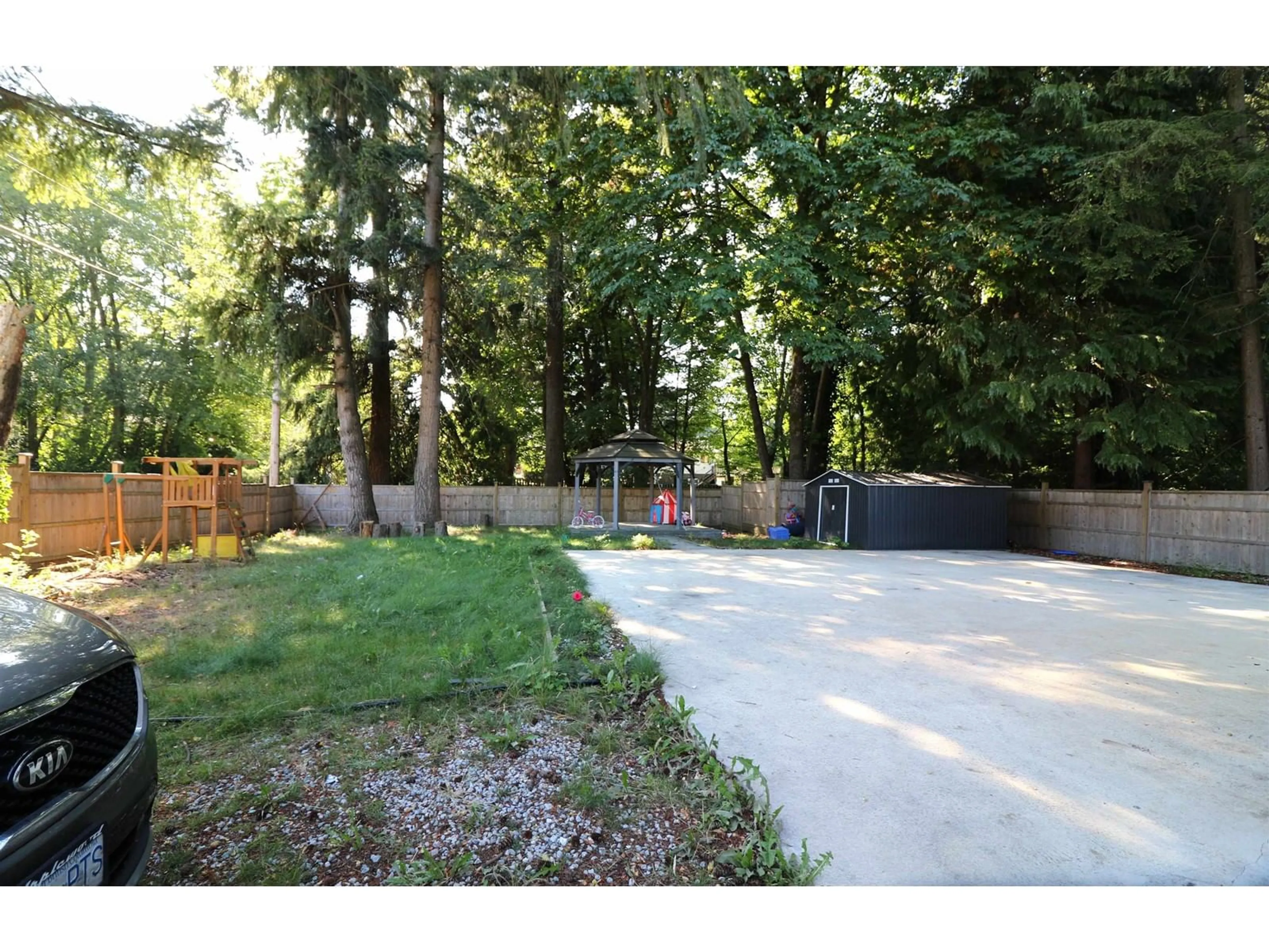 Patio, the fenced backyard for 7857 140 STREET, Surrey British Columbia V3W5K5