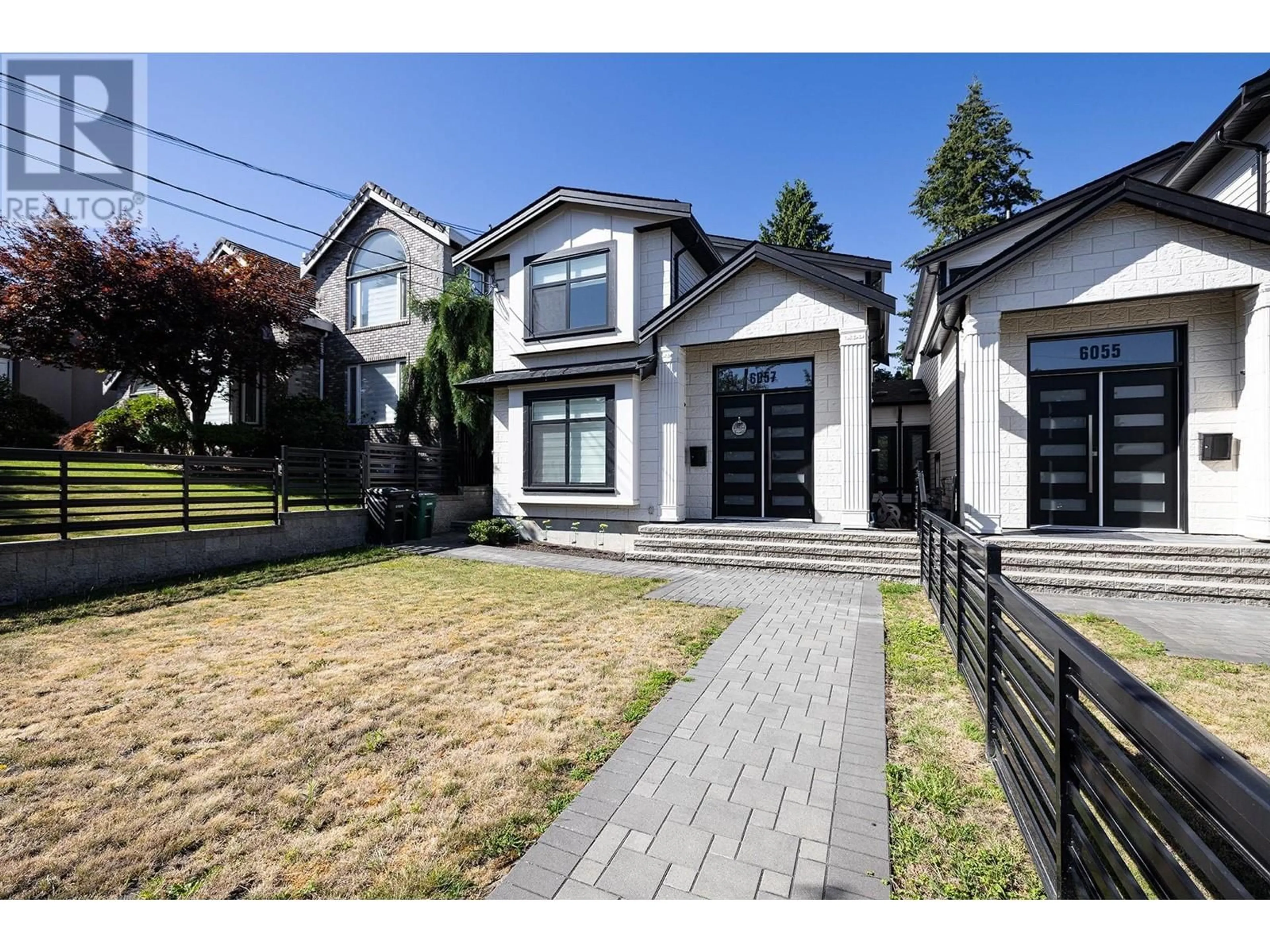 Frontside or backside of a home, the fenced backyard for 6057 LEIBLY AVENUE, Burnaby British Columbia V5E3C7