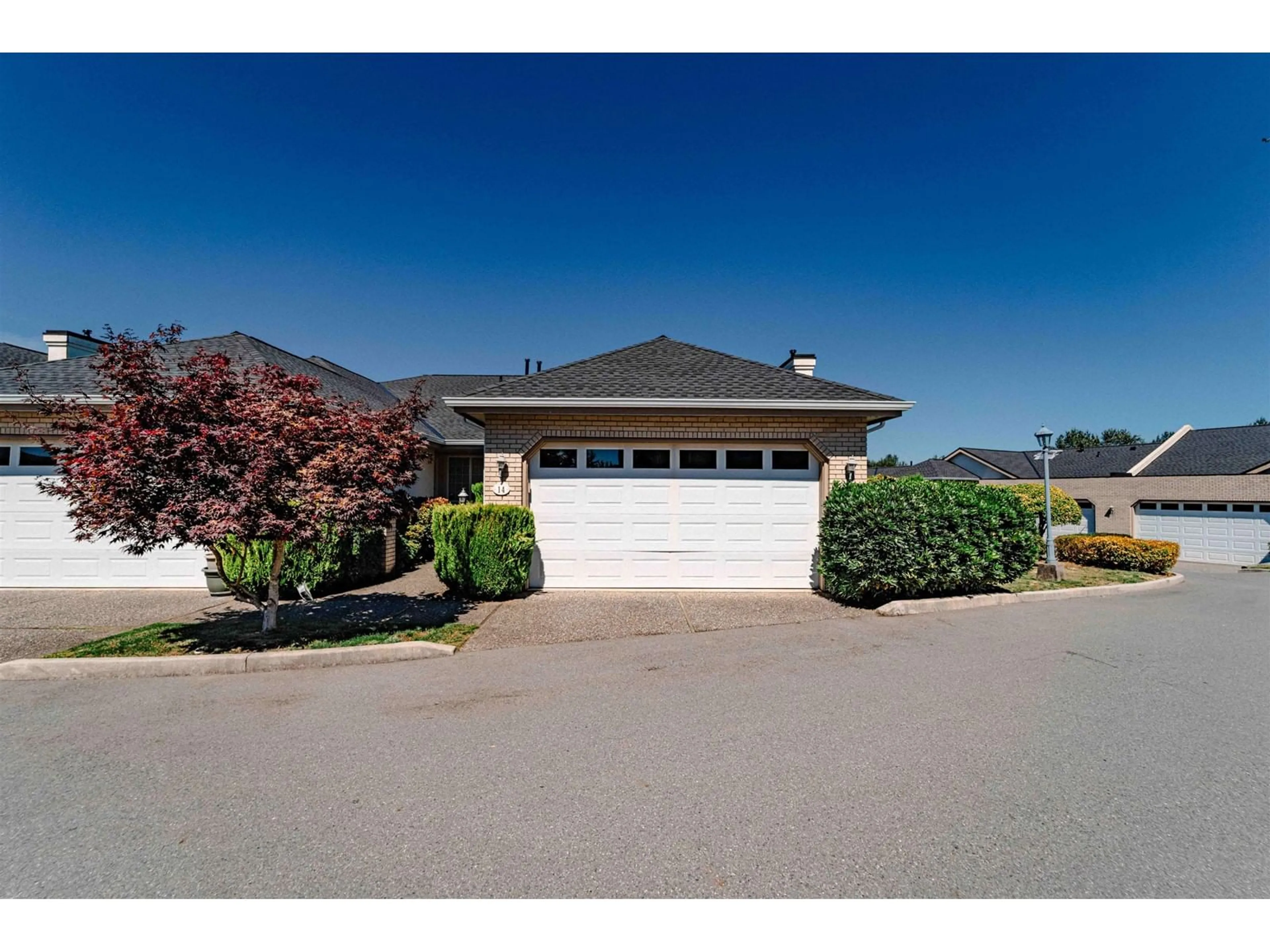 Frontside or backside of a home, the street view for 14 31450 SPUR AVENUE, Abbotsford British Columbia V2T5M3