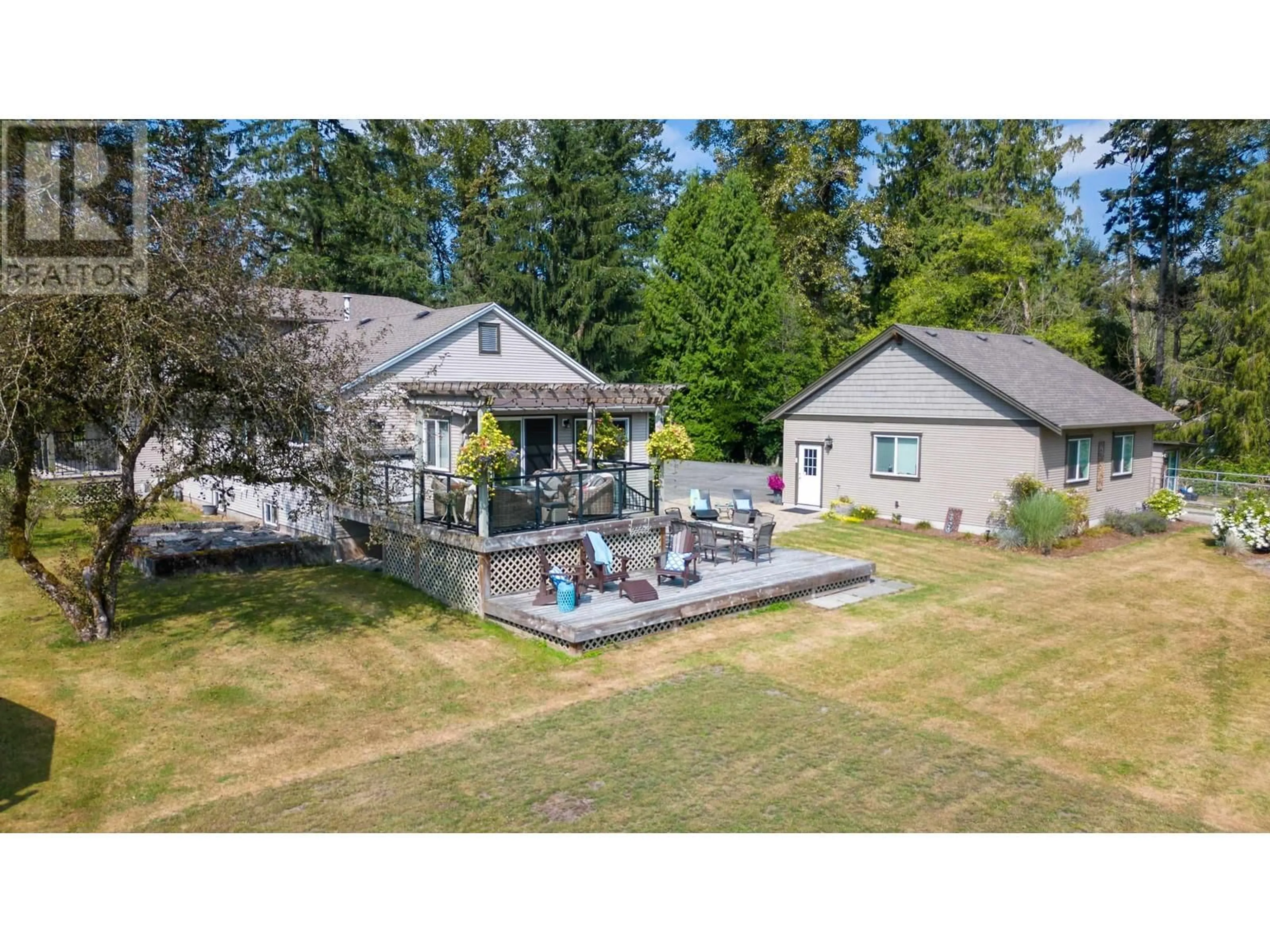 Frontside or backside of a home, the fenced backyard for 24284 116 AVENUE, Maple Ridge British Columbia V4R1L7