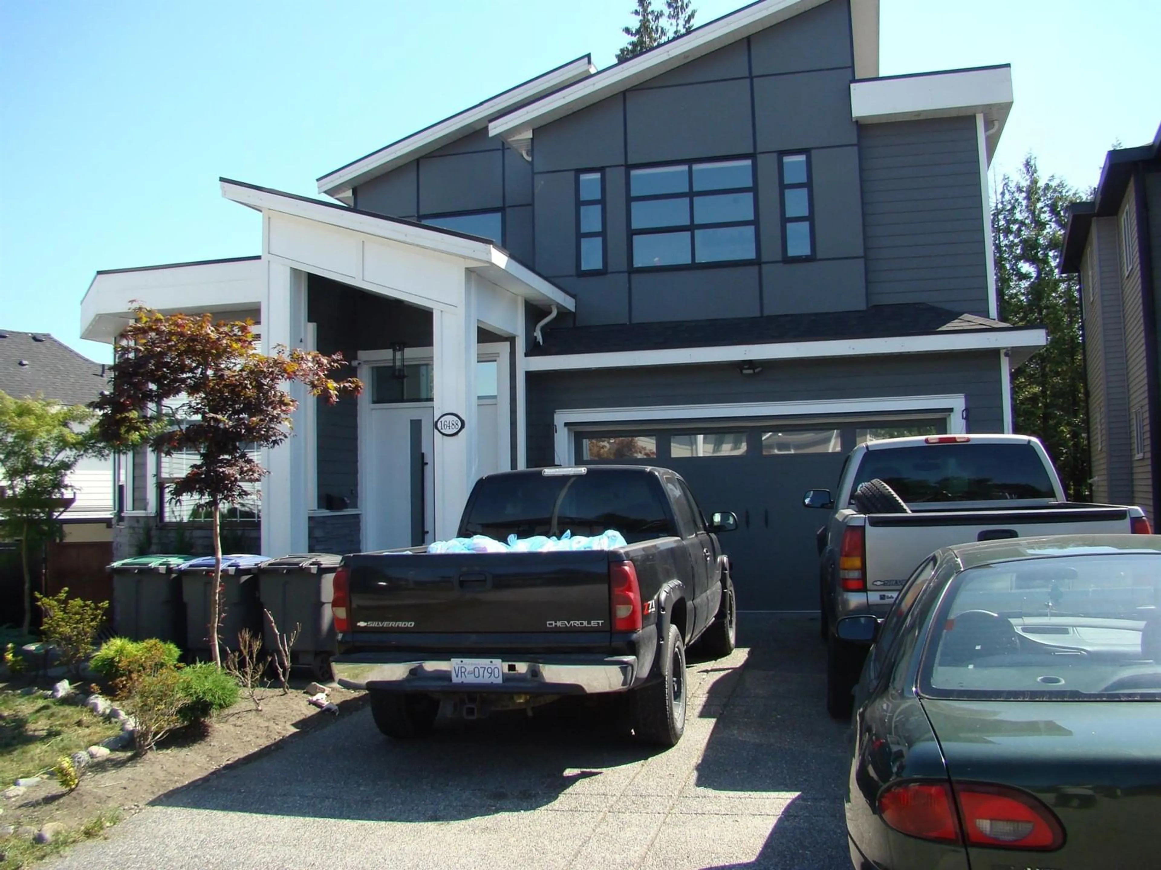 Home with vinyl exterior material, street for 16488 103 AVENUE, Surrey British Columbia V4N1Y6