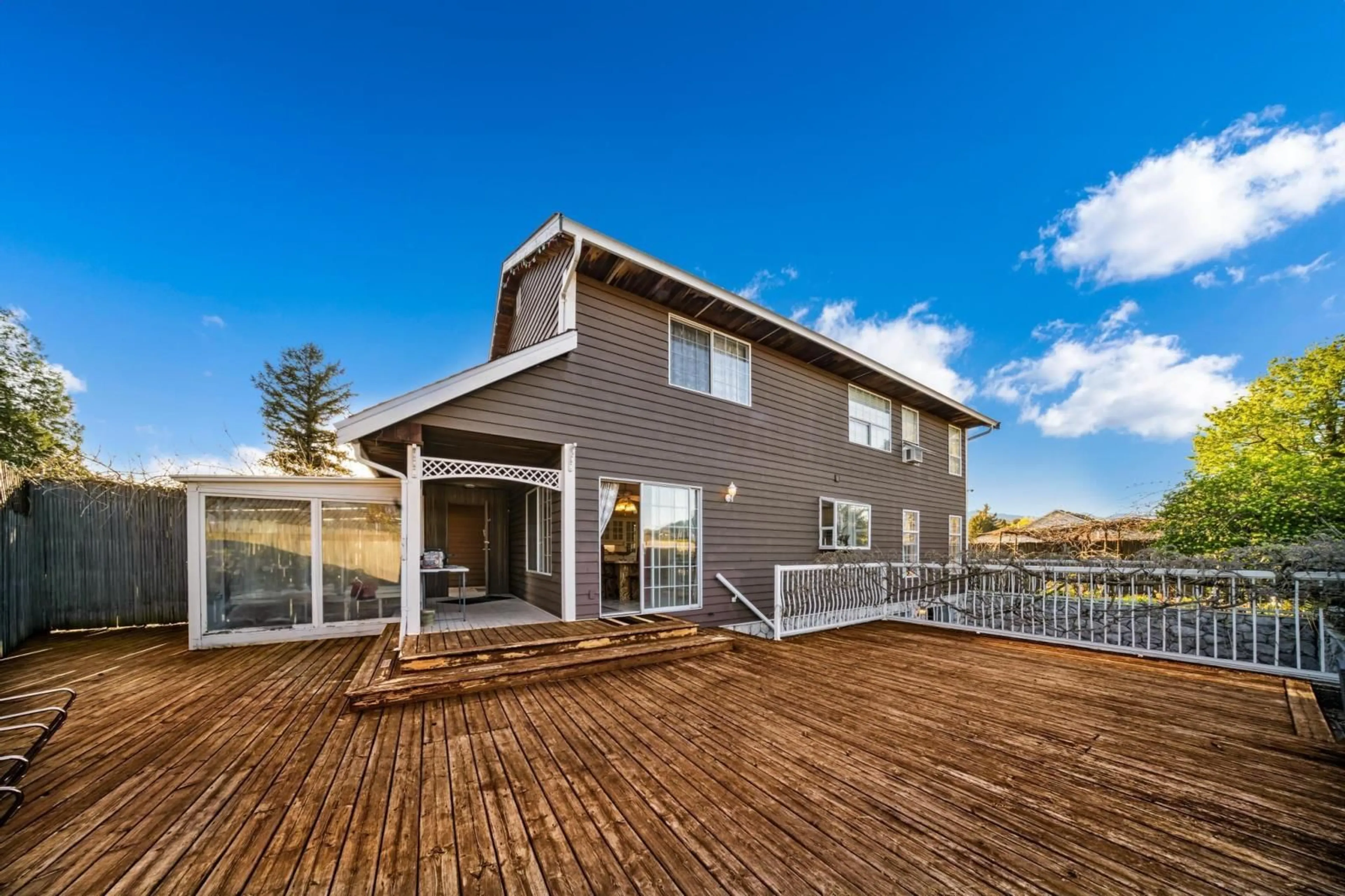 Frontside or backside of a home, the fenced backyard for 44685 CUMBERLAND AVENUE, Chilliwack British Columbia V2R3B6