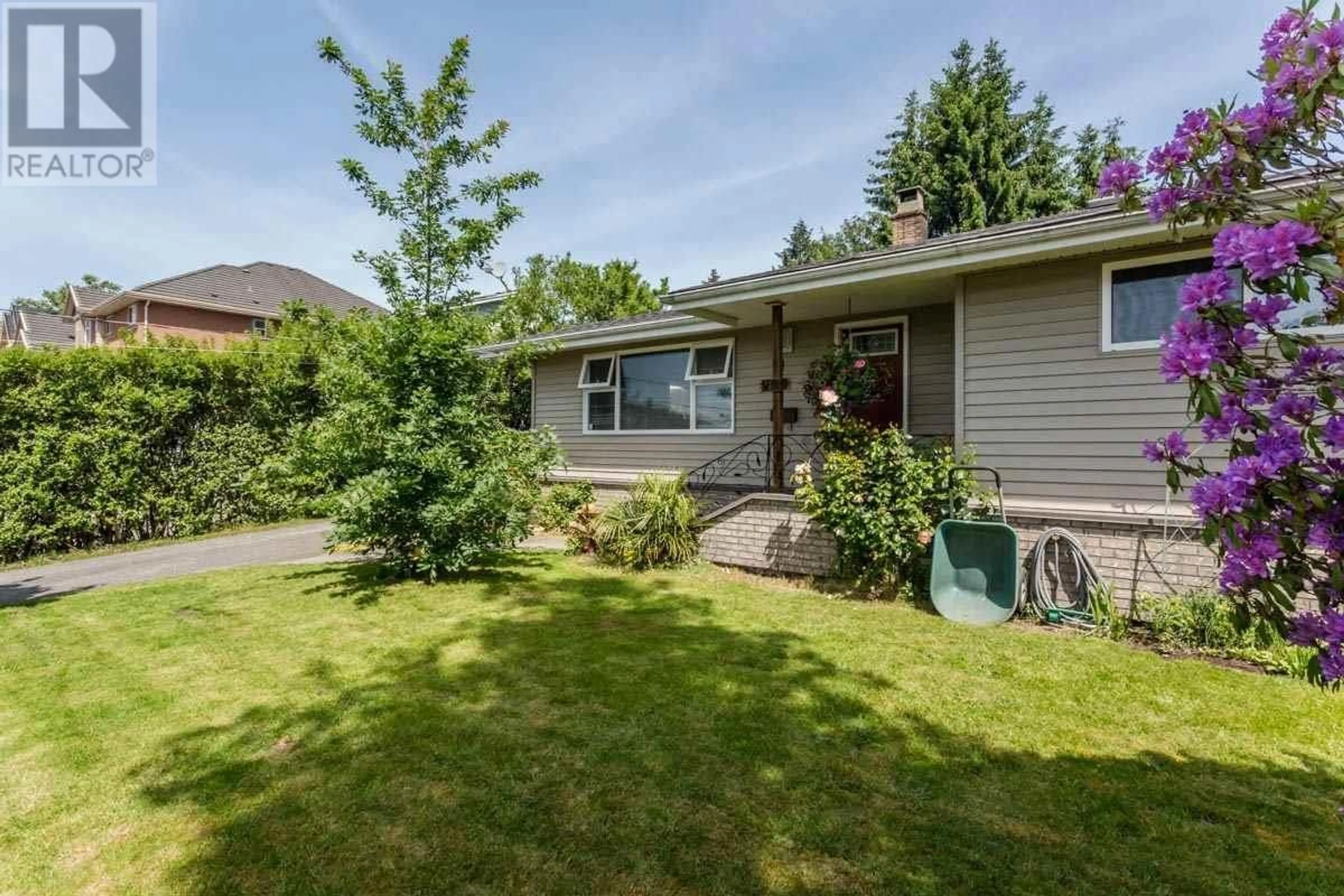 Frontside or backside of a home, the fenced backyard for 923 QUADLING AVENUE, Coquitlam British Columbia V3K2A6