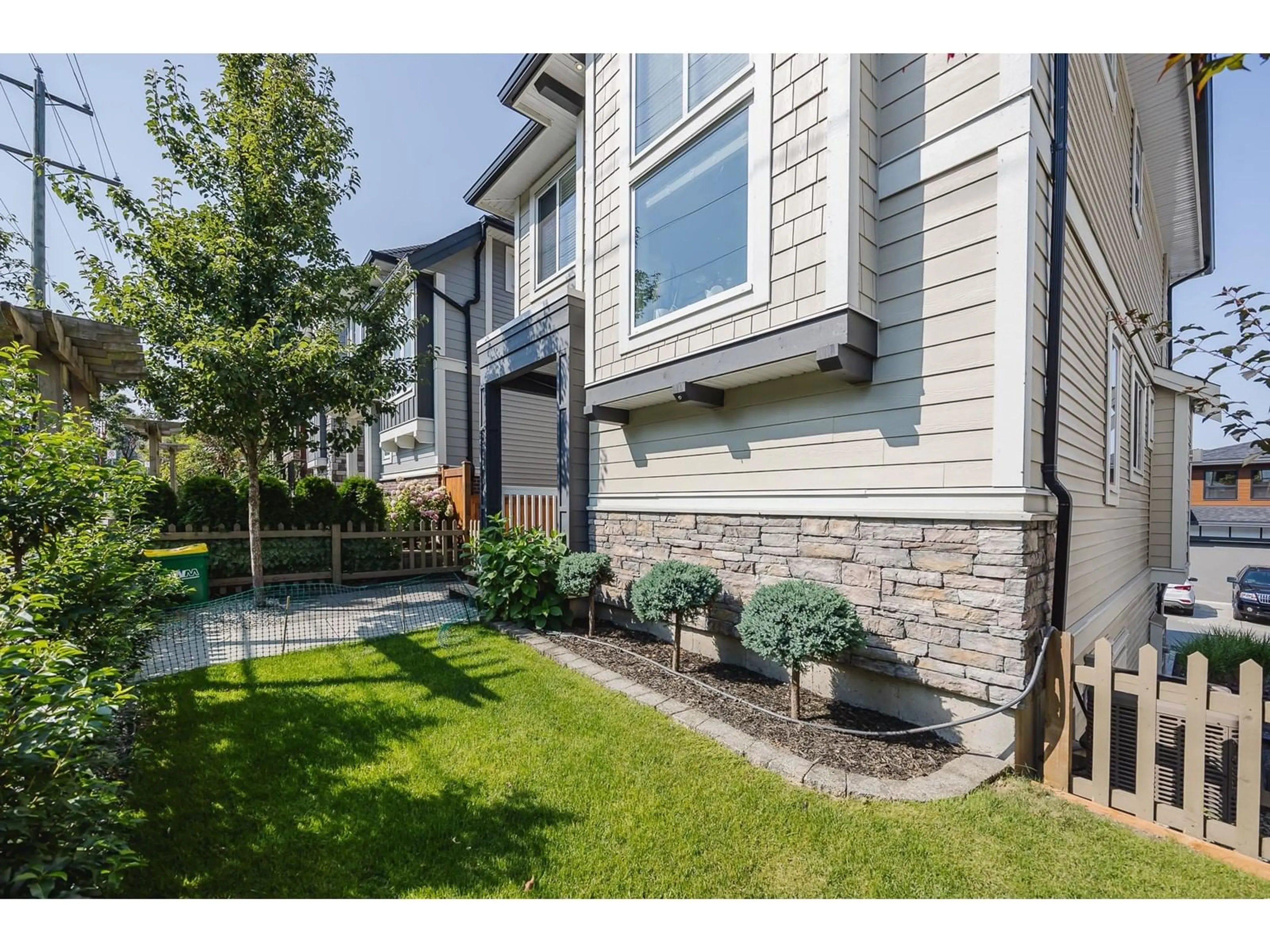 Frontside or backside of a home, the fenced backyard for 12 4295 OLD CLAYBURN ROAD, Abbotsford British Columbia V3G0G4