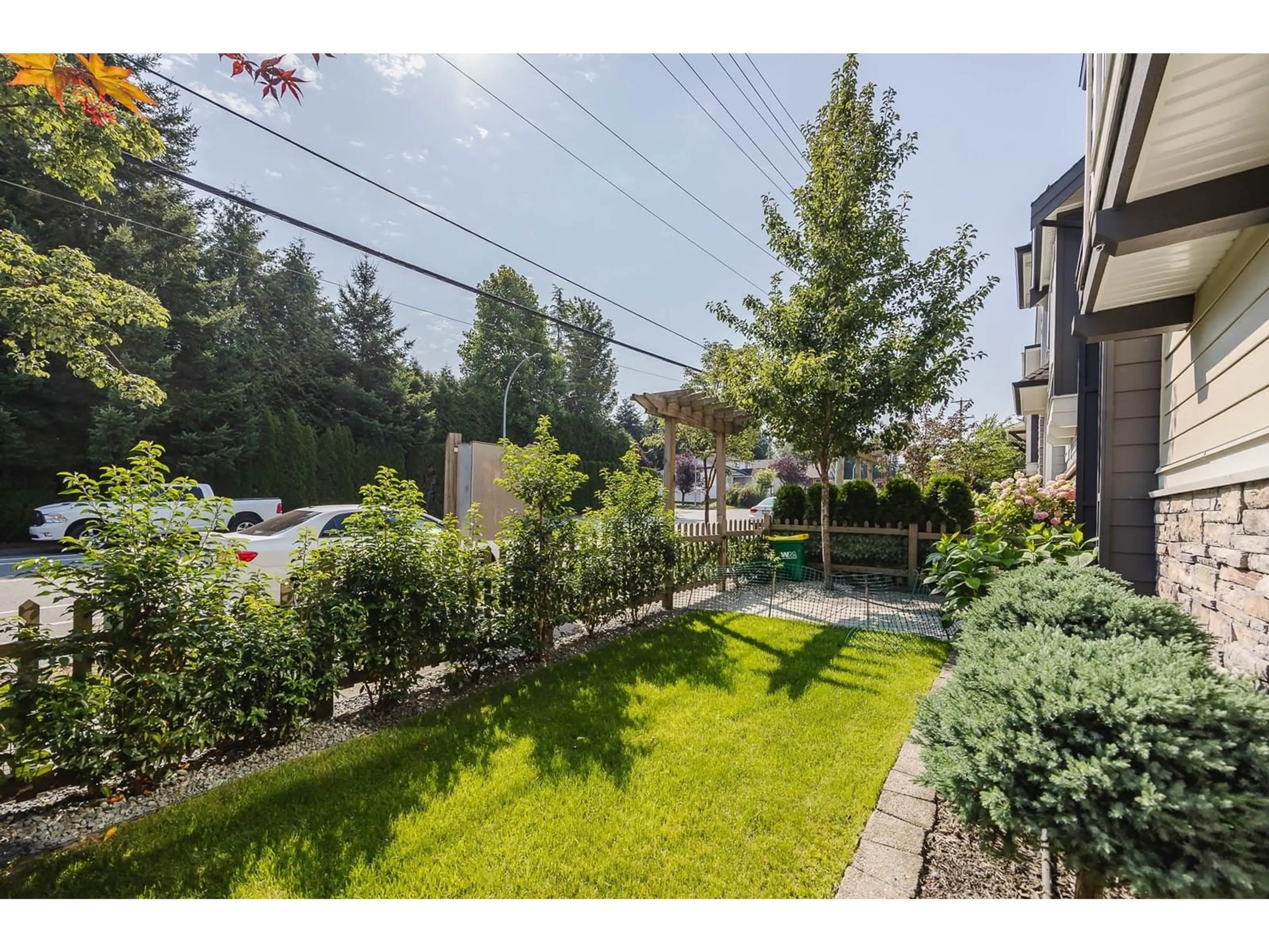 A pic from exterior of the house or condo, the fenced backyard for 12 4295 OLD CLAYBURN ROAD, Abbotsford British Columbia V3G0G4