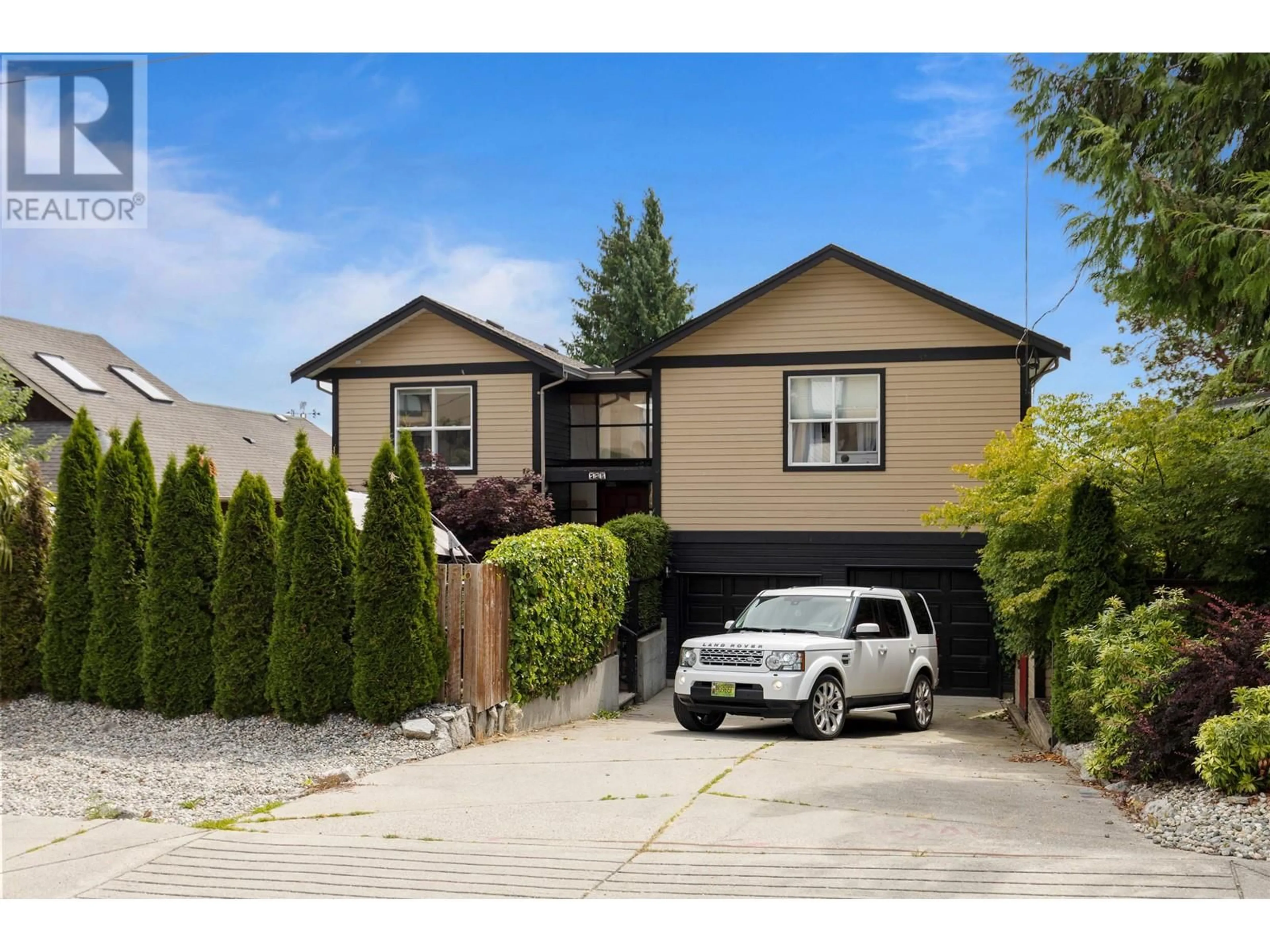 Frontside or backside of a home, the fenced backyard for 556 SEAVIEW ROAD, Gibsons British Columbia V0N1V9