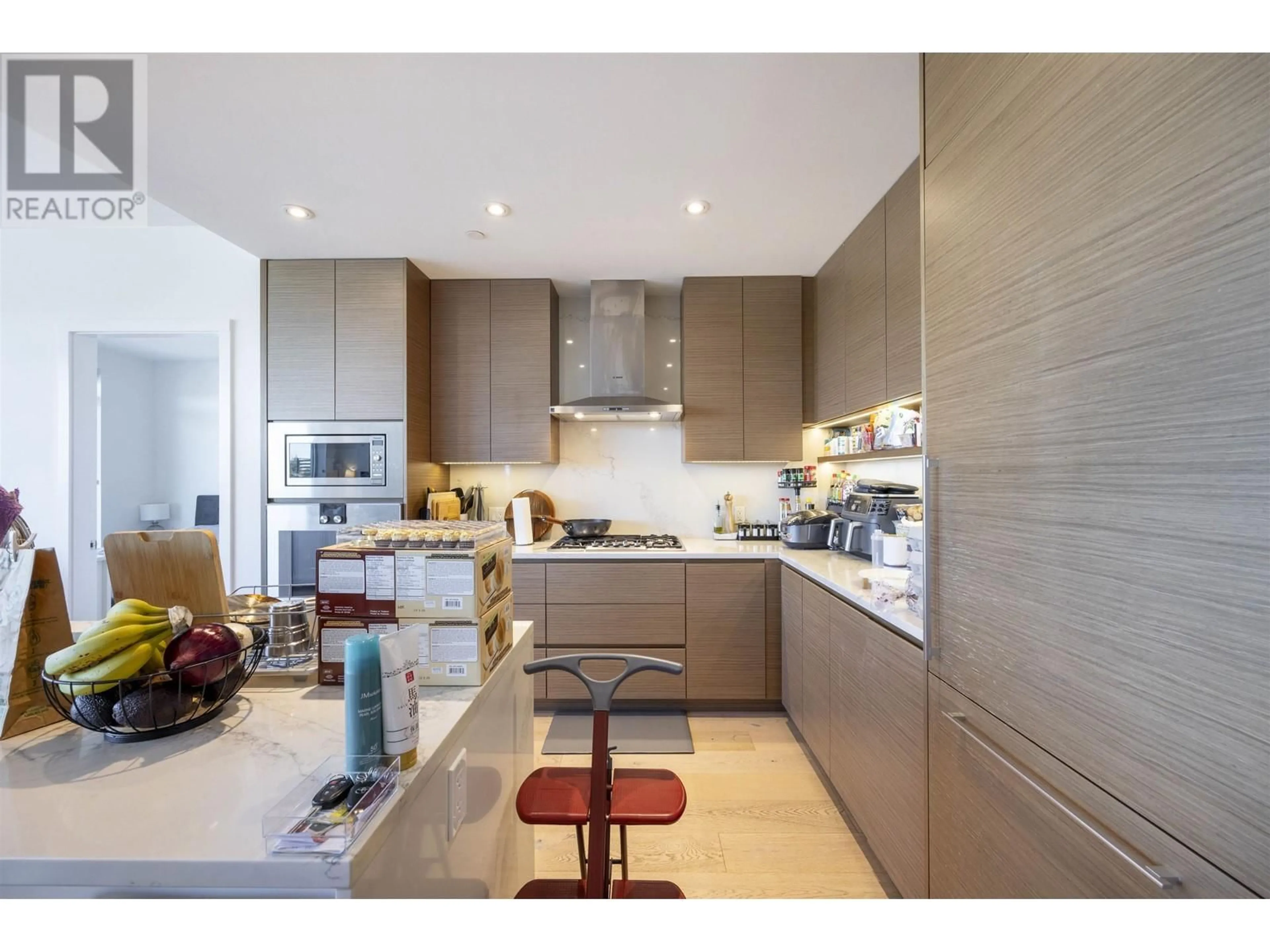 Contemporary kitchen, wood floors for 603 5693 ELIZABETH STREET, Vancouver British Columbia V5Y3K1