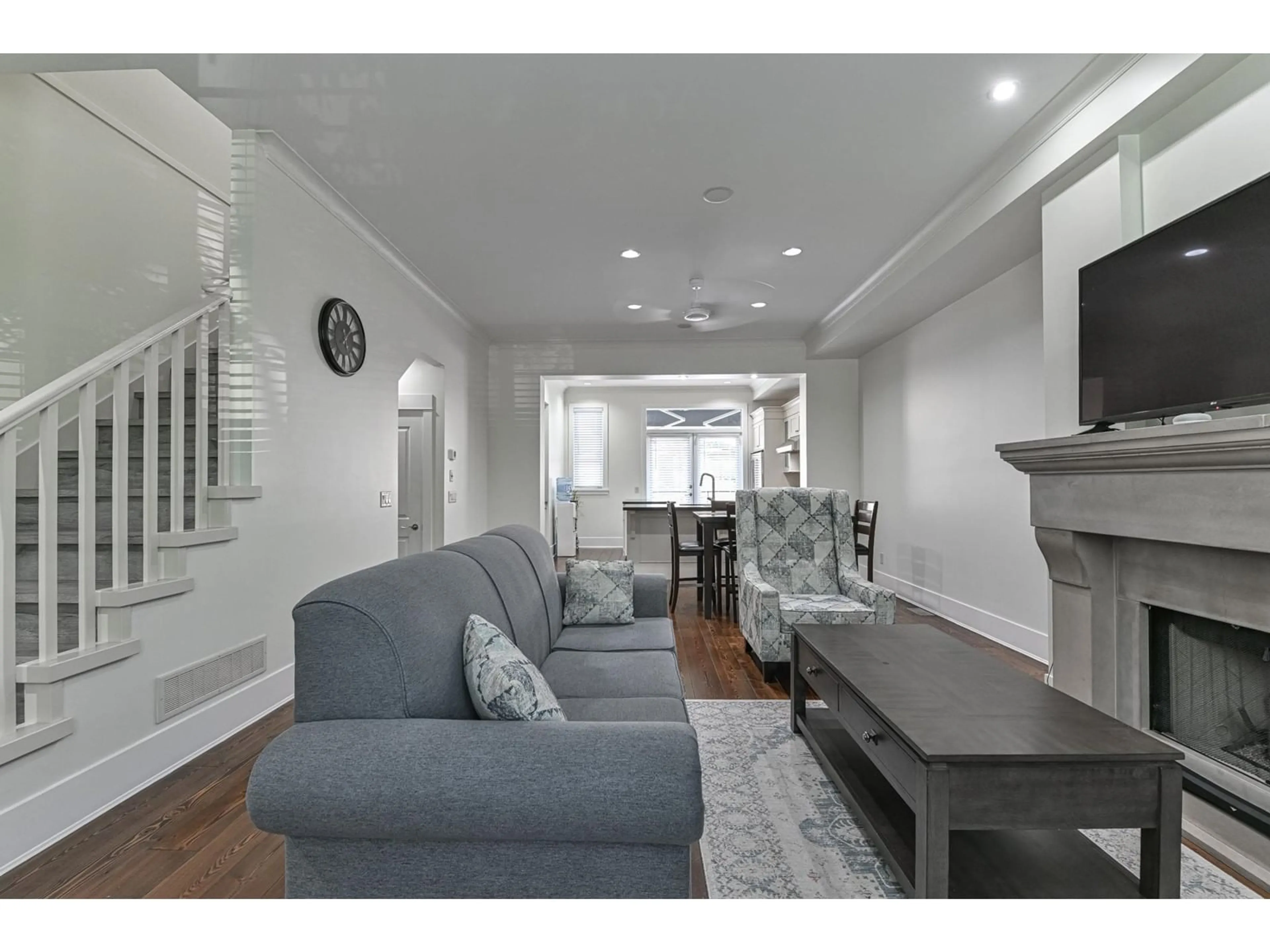 Living room, wood floors for 103 2580 LANGDON STREET, Abbotsford British Columbia V2T0A9