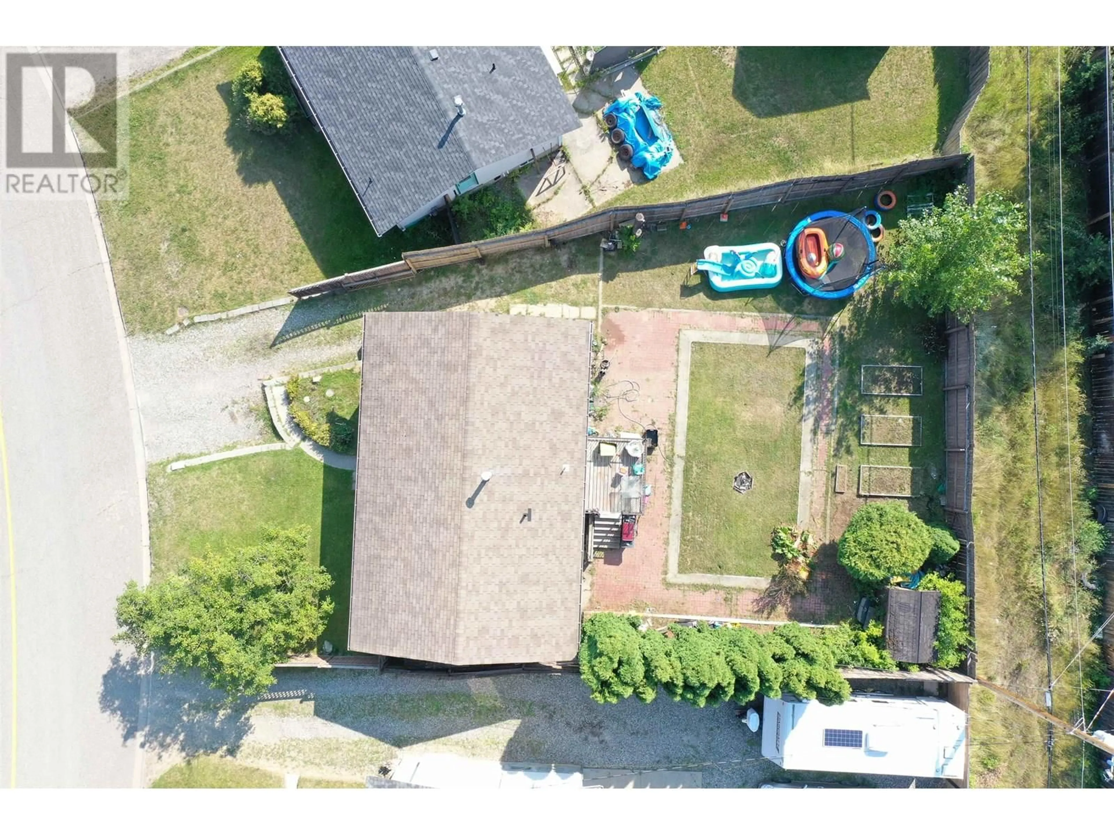 A pic from outside/outdoor area/front of a property/back of a property/a pic from drone, street for 1394 LEWIS DRIVE, Quesnel British Columbia V2J1K8