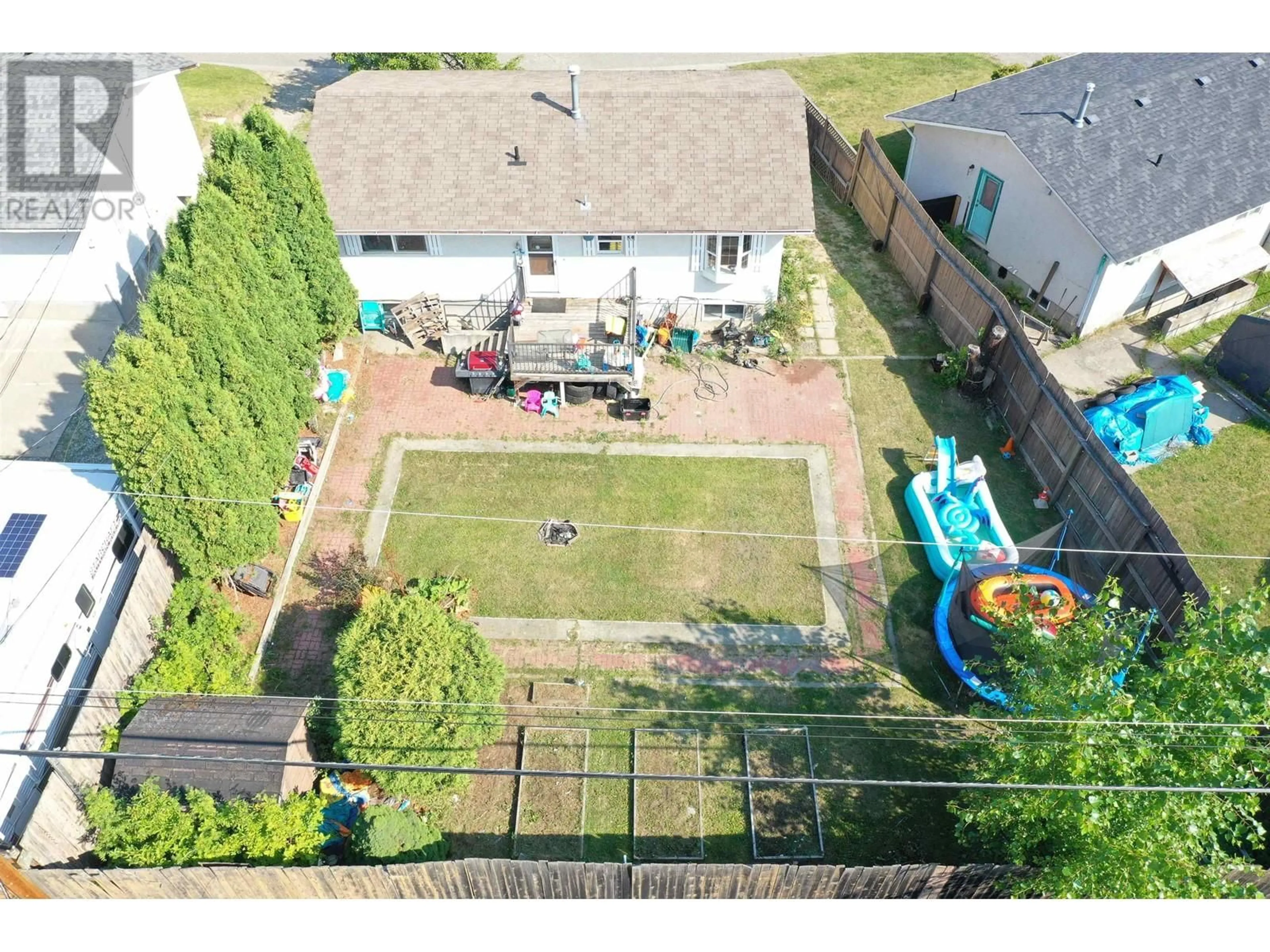 Frontside or backside of a home, the fenced backyard for 1394 LEWIS DRIVE, Quesnel British Columbia V2J1K8