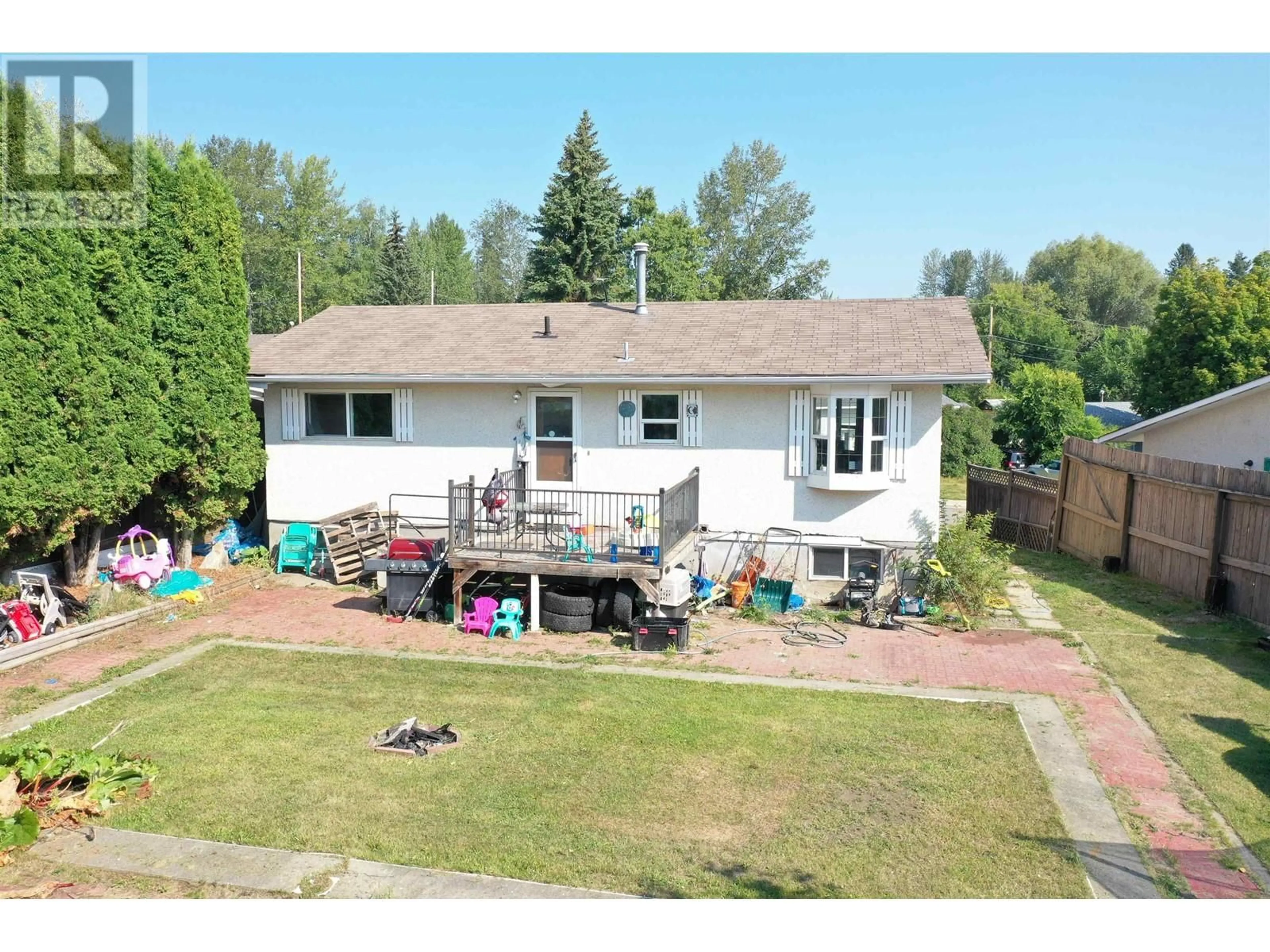 Frontside or backside of a home, the fenced backyard for 1394 LEWIS DRIVE, Quesnel British Columbia V2J1K8