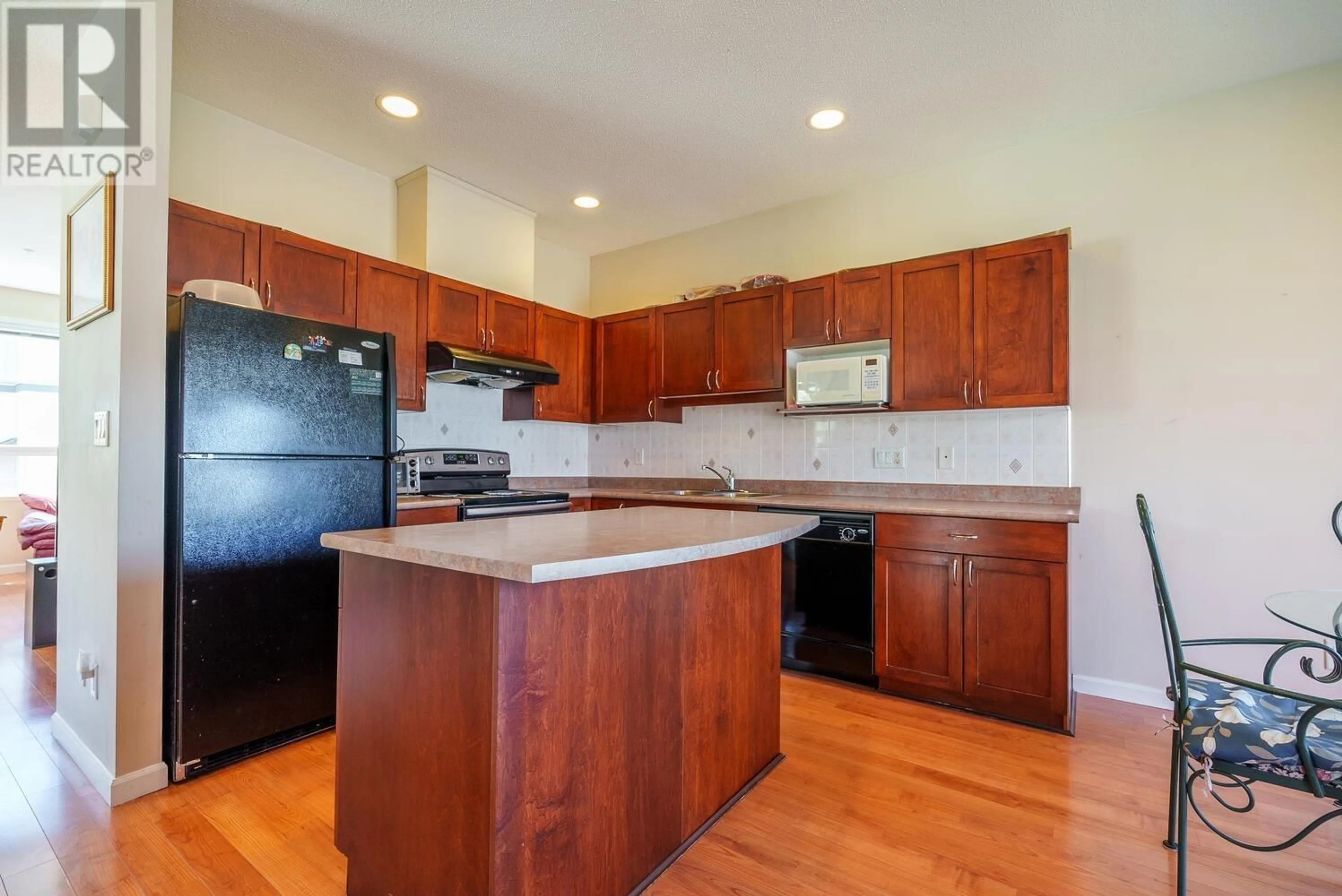 Open concept kitchen, wood/laminate floor for 19 - 3127 SKEENA STREET, Port Coquitlam British Columbia V3B8G5