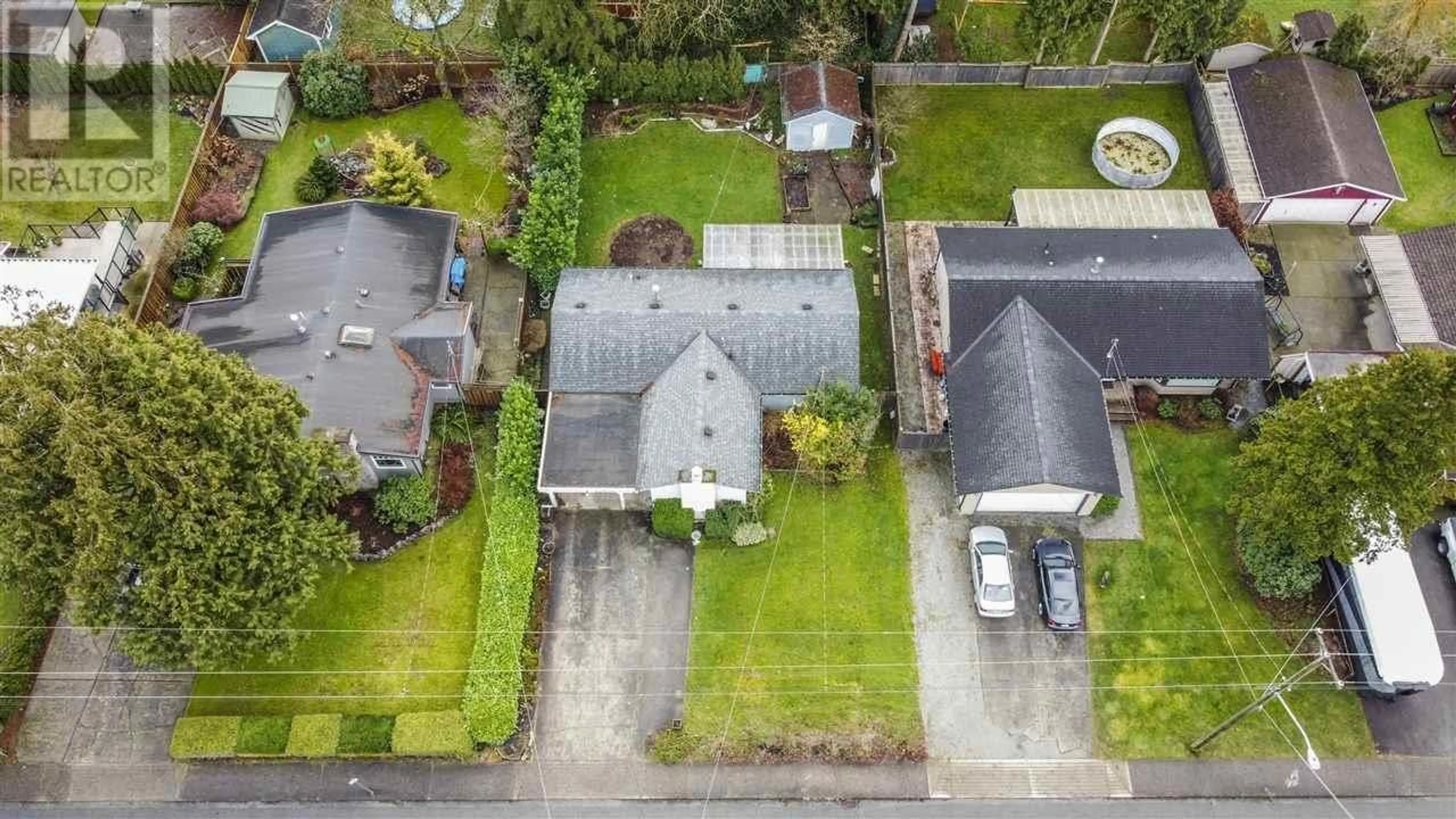 Frontside or backside of a home, the fenced backyard for 21022 123 AVENUE, Maple Ridge British Columbia V2X4B4