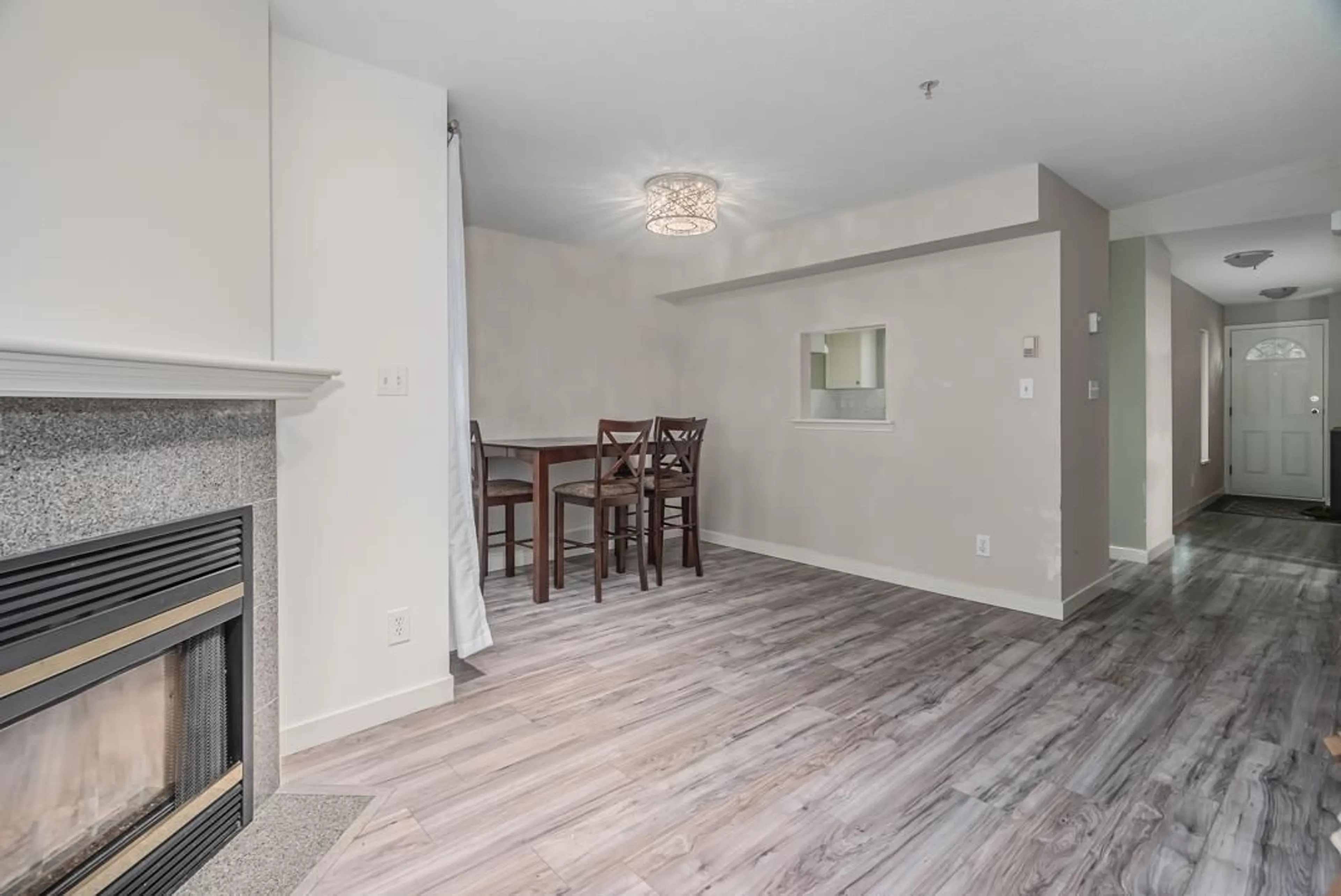 A pic of a room, wood floors for 48 8892 208 STREET, Langley British Columbia V1M2N8