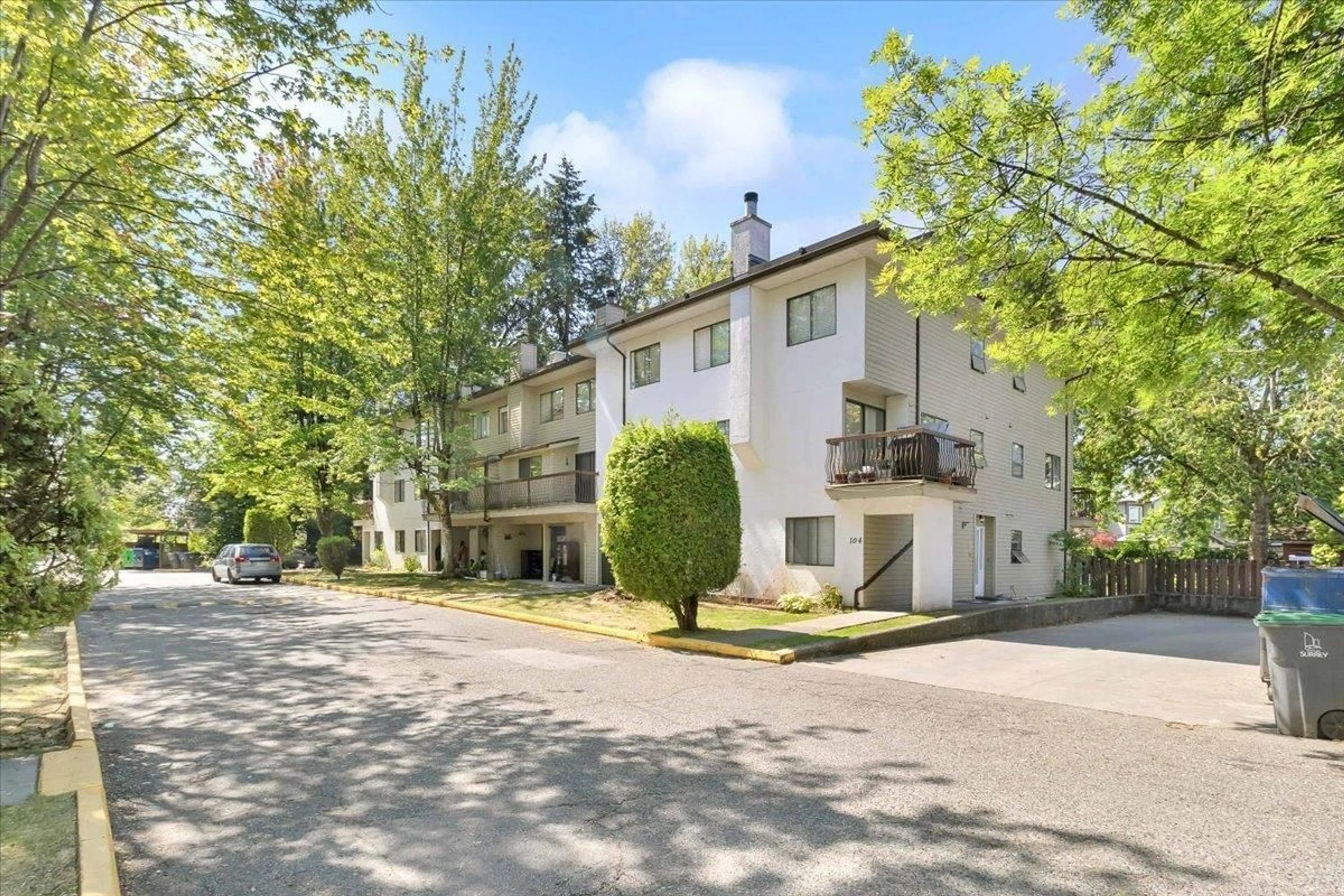 A pic from exterior of the house or condo, the street view for 204 7119 133 STREET, Surrey British Columbia V3W7Z6