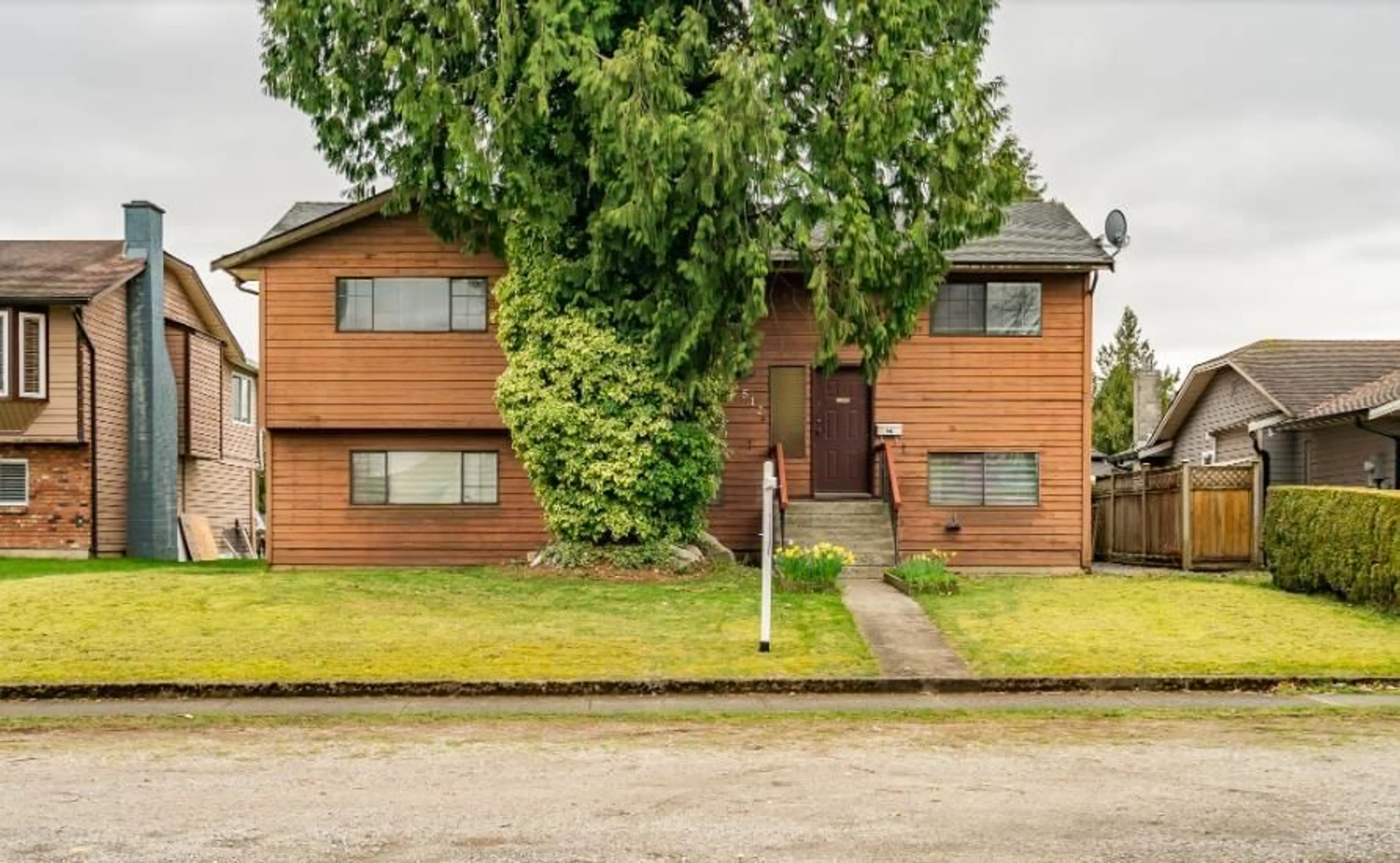 Home with brick exterior material, street for 15512 100 AVENUE, Surrey British Columbia V3R7S4