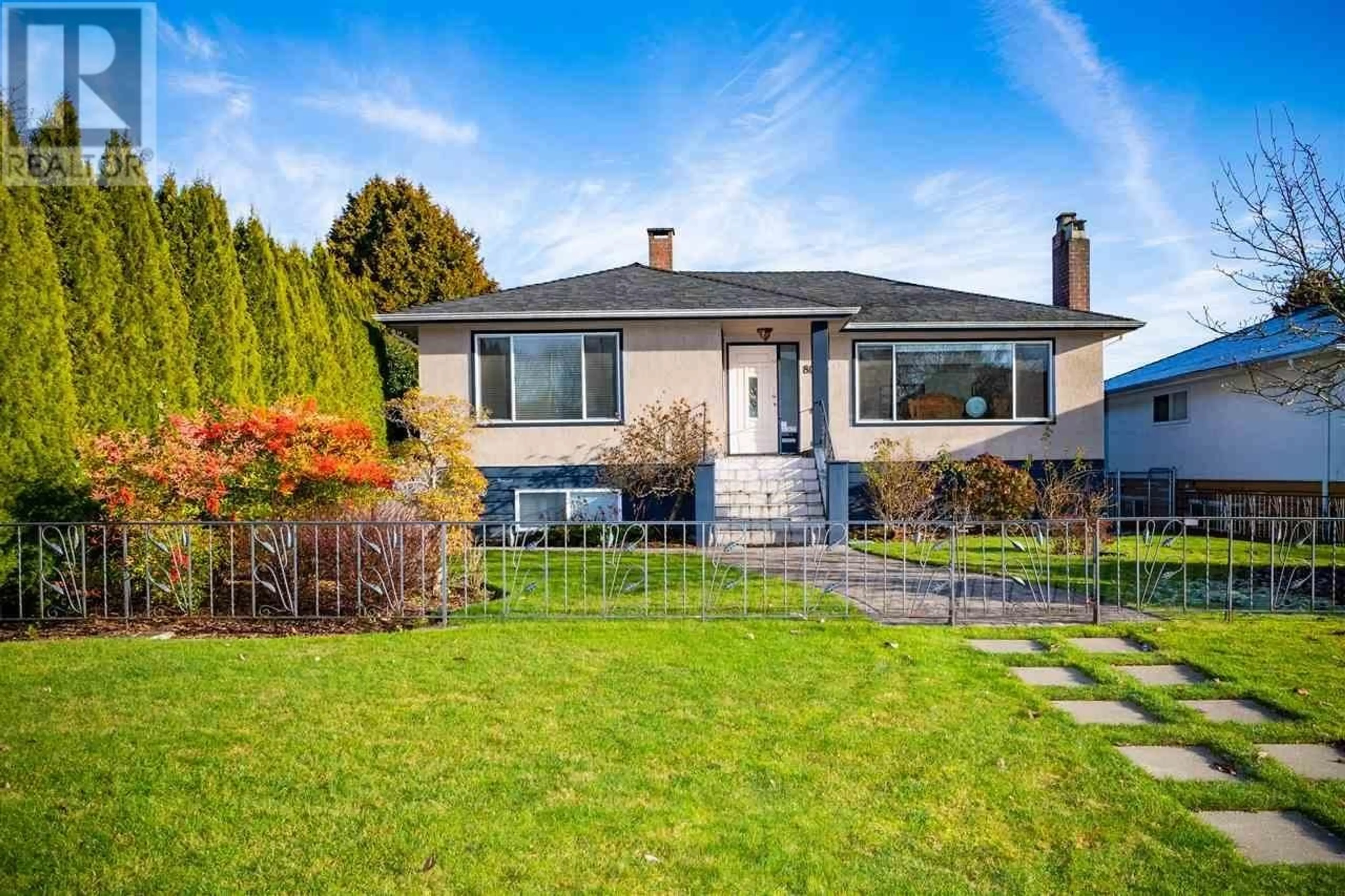 Frontside or backside of a home, the fenced backyard for 8090 LAUREL STREET, Vancouver British Columbia V6P3V1