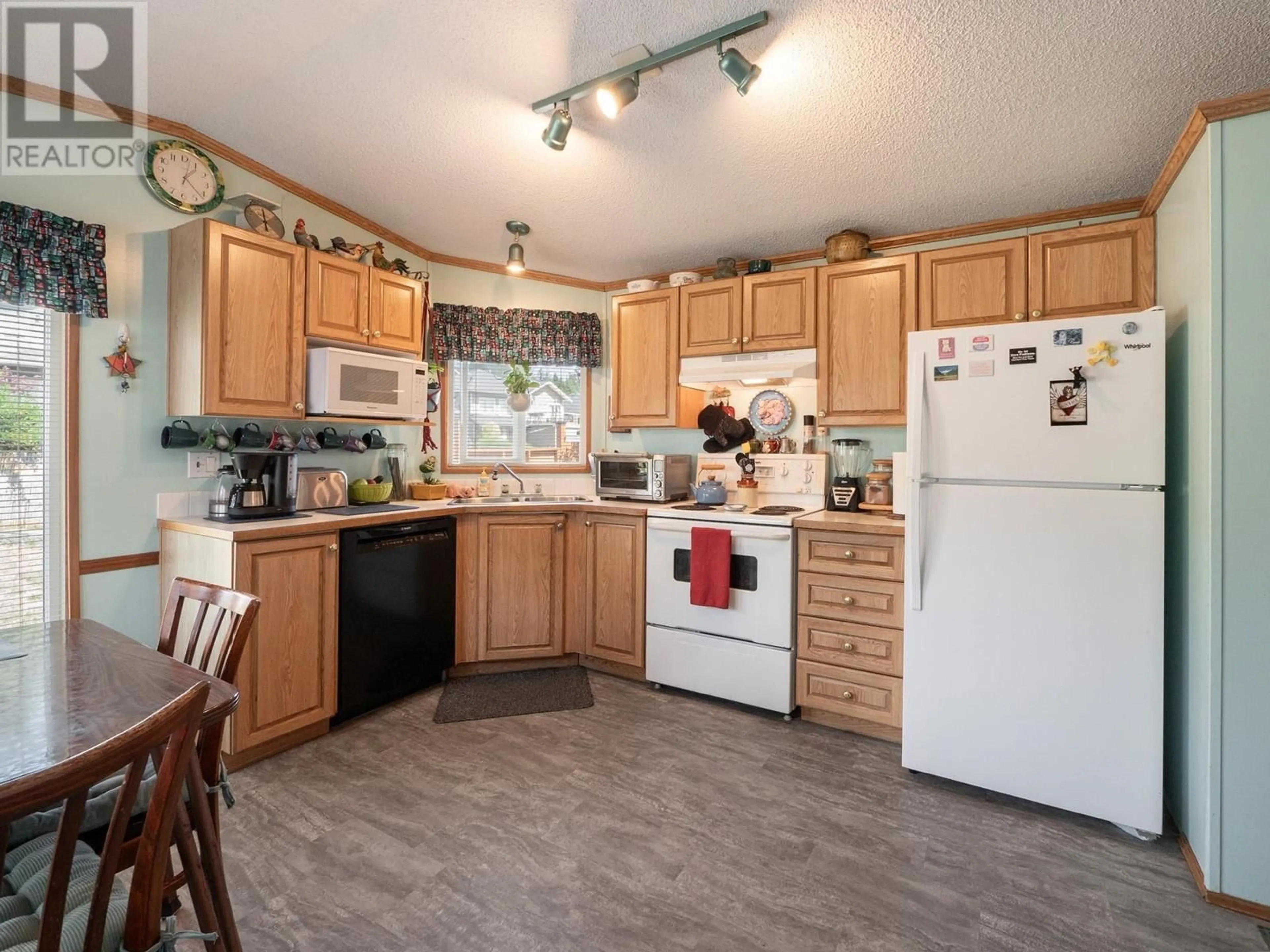 Standard kitchen, wood floors, cottage for 753 STEINBRUNNER ROAD, Gibsons British Columbia V0N1V9