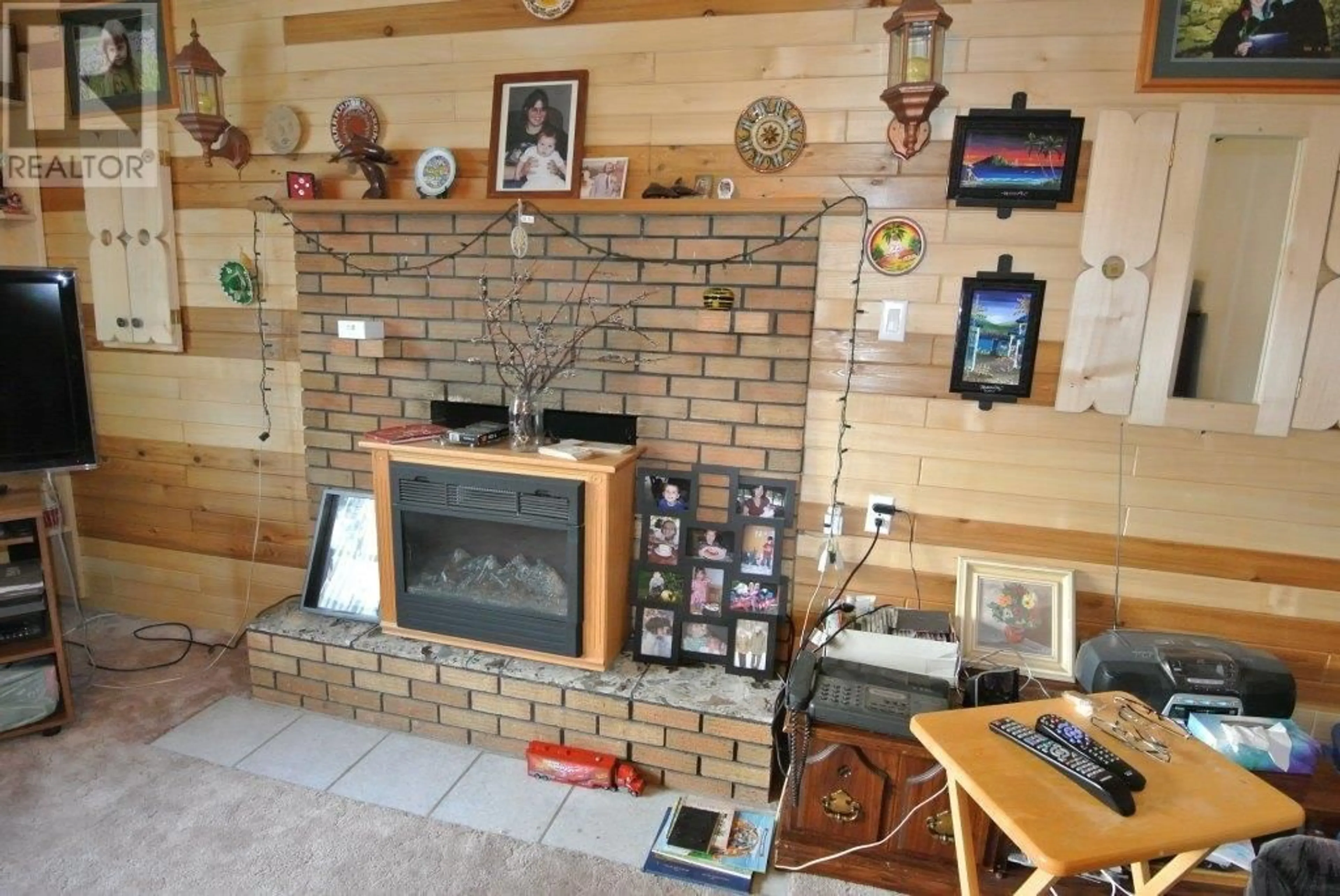 Living room, wood floors for 4045 6TH AVENUE, New Hazelton British Columbia V0J2J0