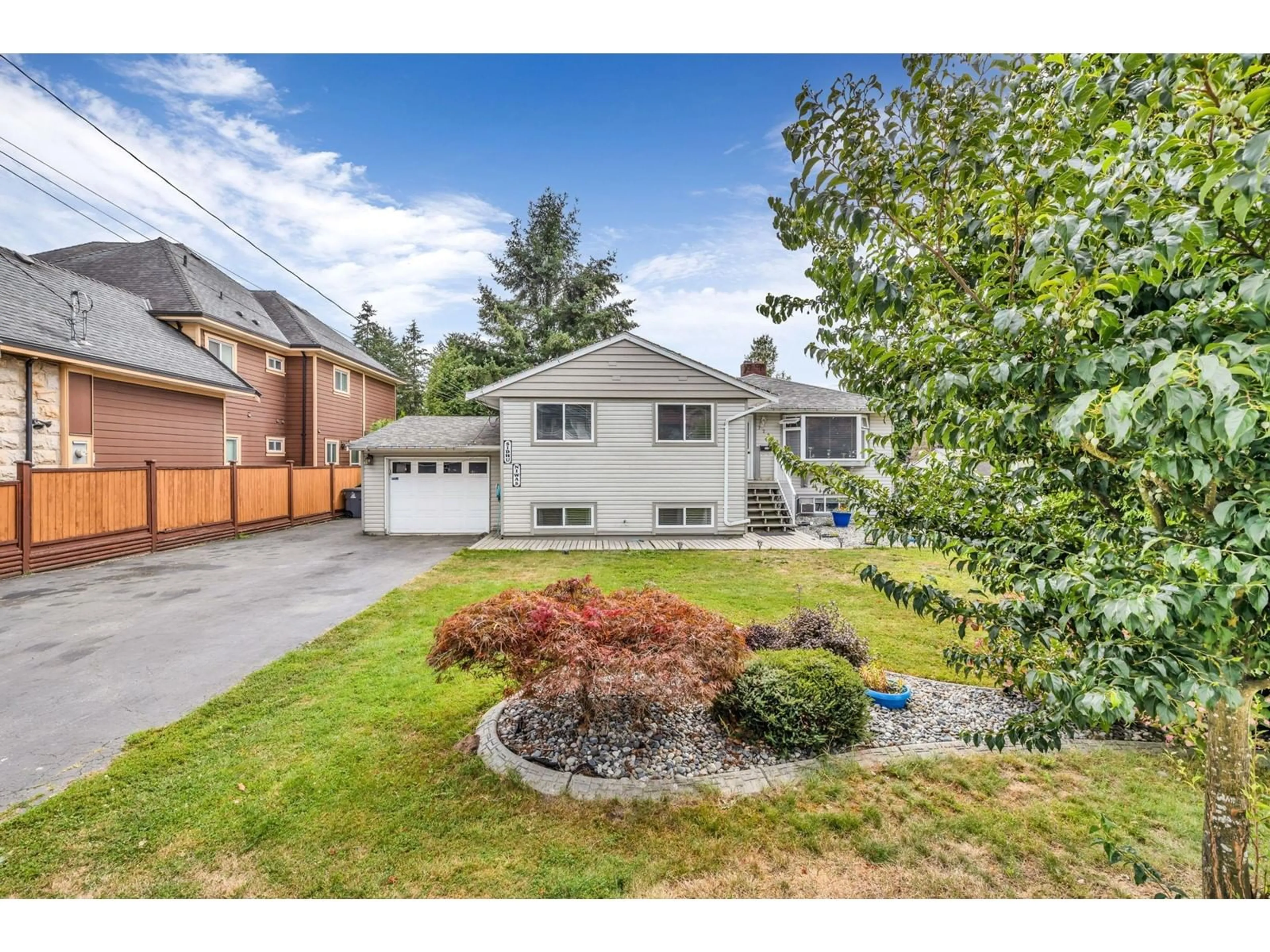 Frontside or backside of a home, the street view for 12916 99 AVENUE, Surrey British Columbia V3T1E7