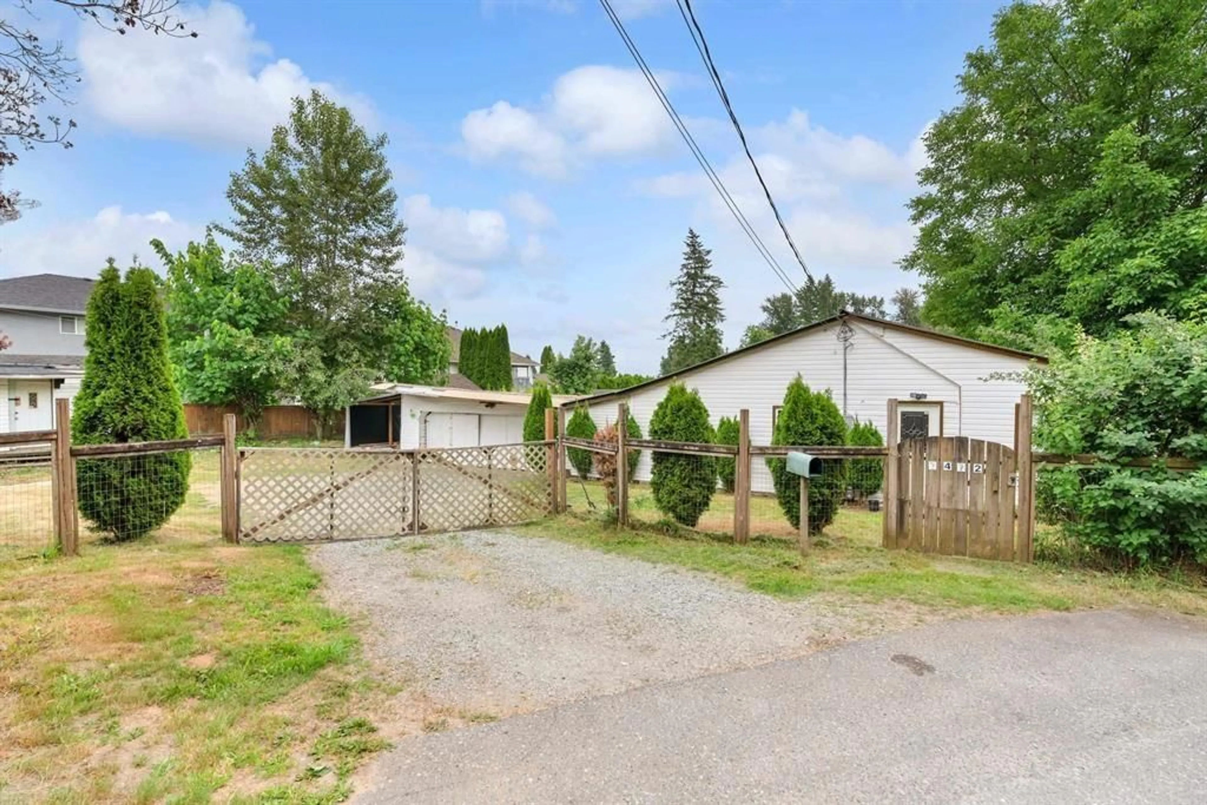 Frontside or backside of a home, the fenced backyard for 7472 TURNER STREET, Mission British Columbia V2V2Z3