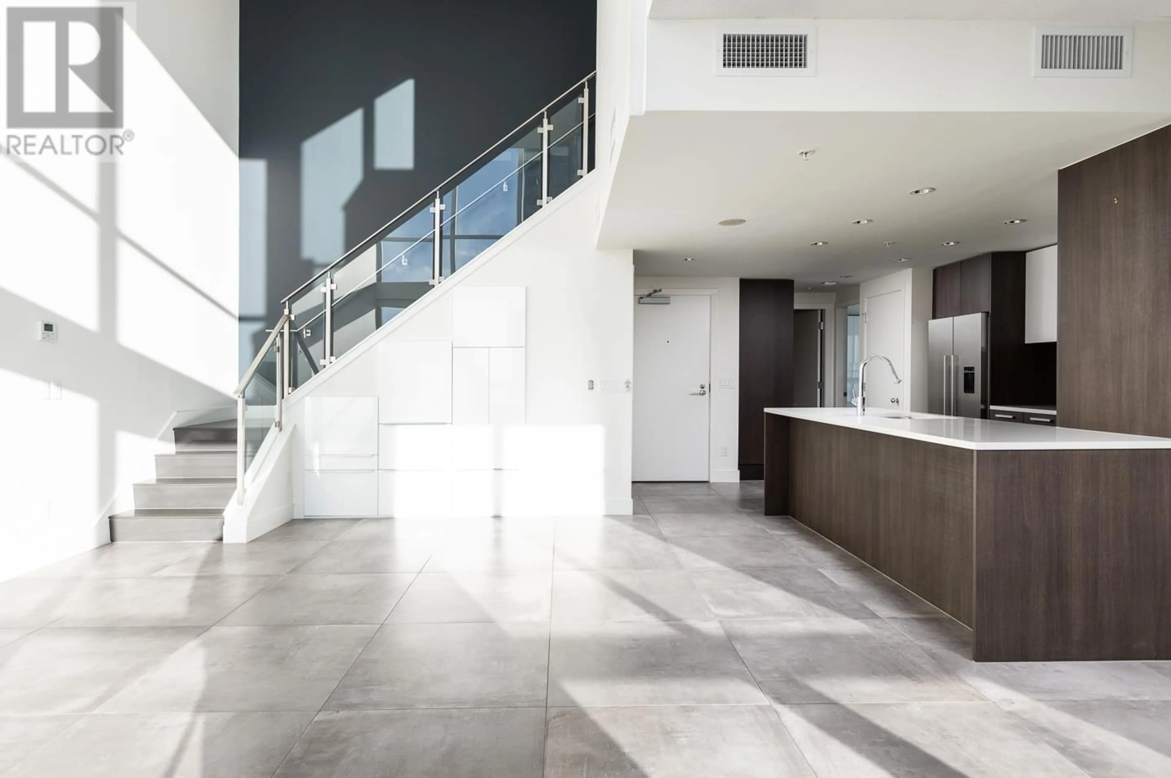 Indoor foyer, cement floor for 3002 3007 GLEN DRIVE, Coquitlam British Columbia V3B0L8