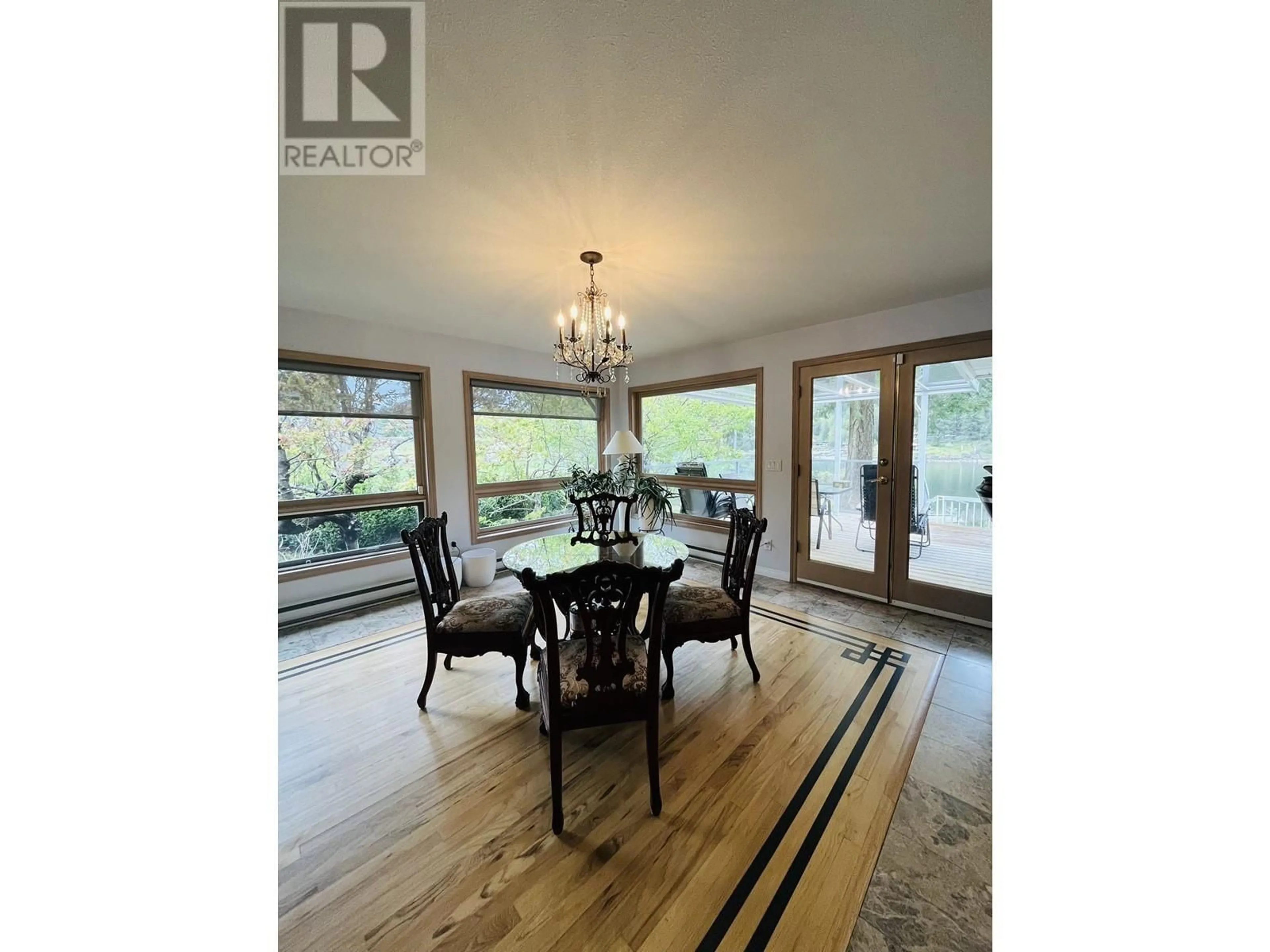 Dining room, wood floors, cottage for 12881 SUNSHINE COAST HIGHWAY, Madeira Park British Columbia V0N2H1