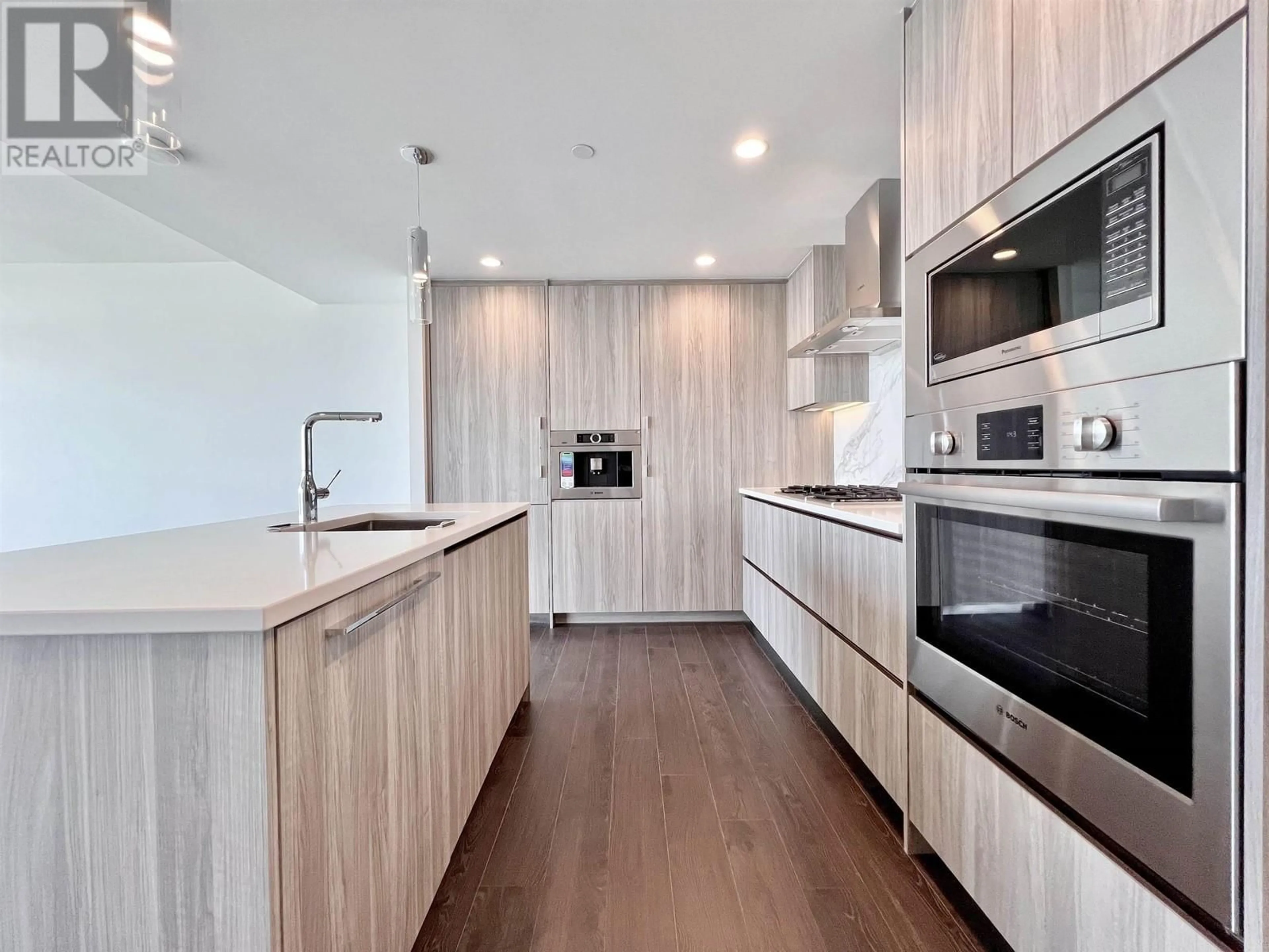 Contemporary kitchen, wood/laminate floor for 3707 - 4890 LOUGHEED HIGHWAY, Burnaby British Columbia V5C0N2
