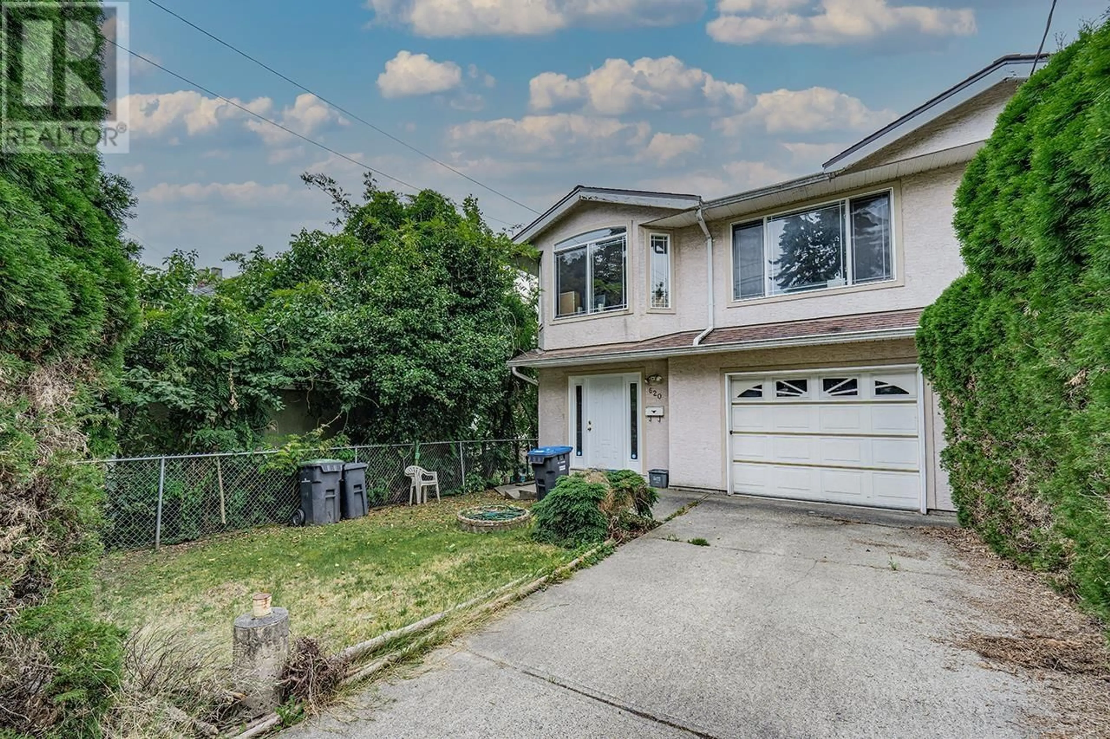 Frontside or backside of a home, the fenced backyard for 620 THIRTEENTH STREET, New Westminster British Columbia V3M4M4