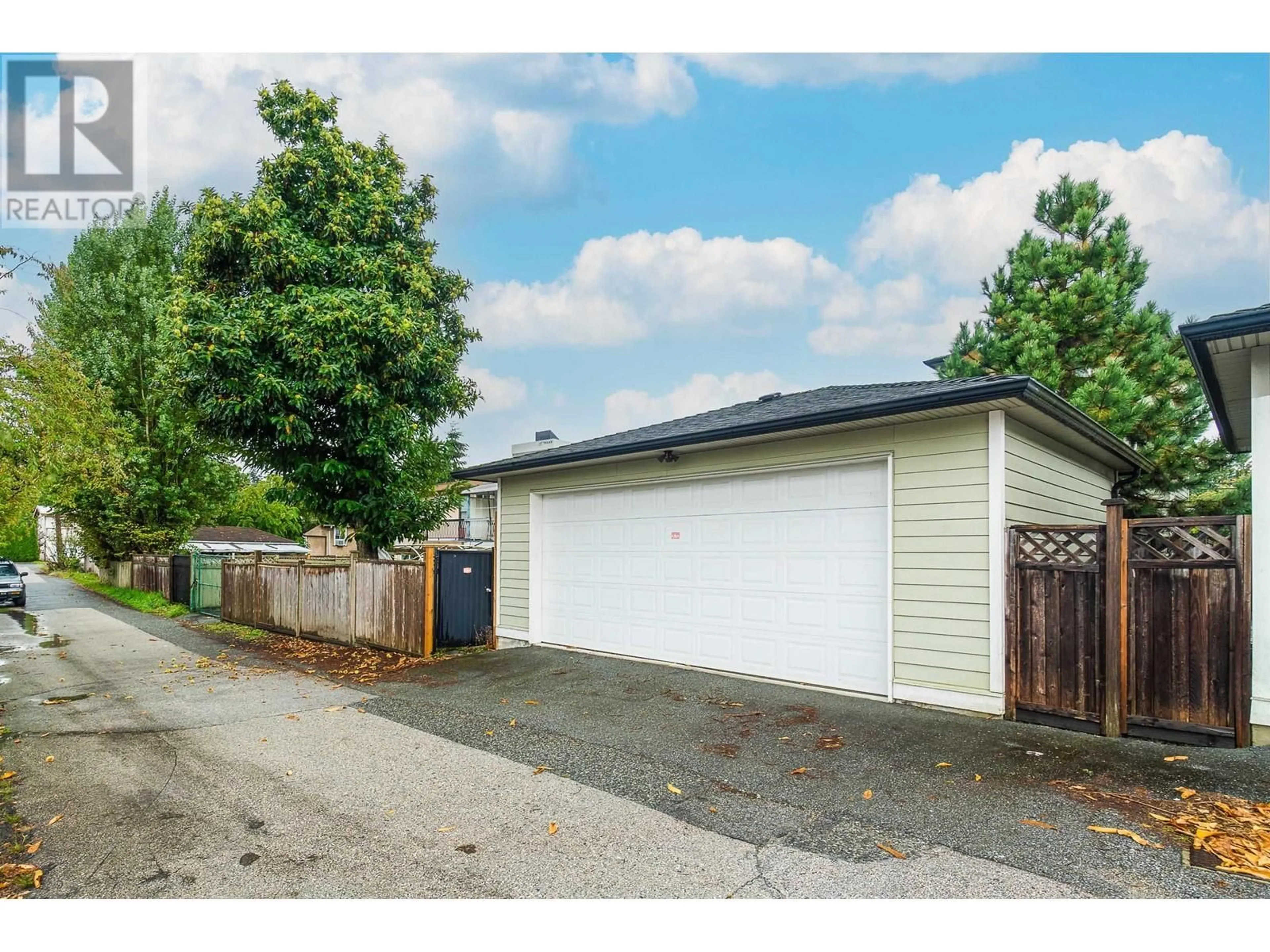 Frontside or backside of a home, the fenced backyard for 5328 CHESHAM AVENUE, Burnaby British Columbia V5H2L2