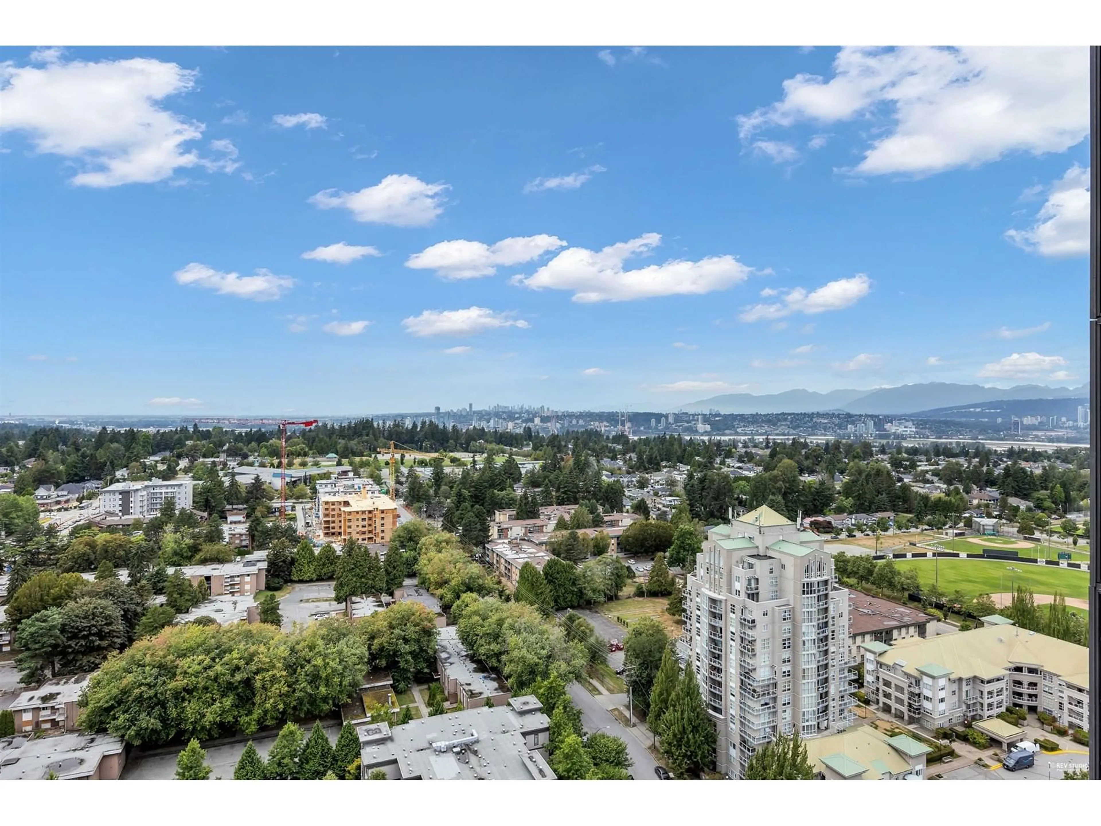 A pic from outside/outdoor area/front of a property/back of a property/a pic from drone, mountain view for 2510 13428 105 AVENUE, Surrey British Columbia V3T0S1