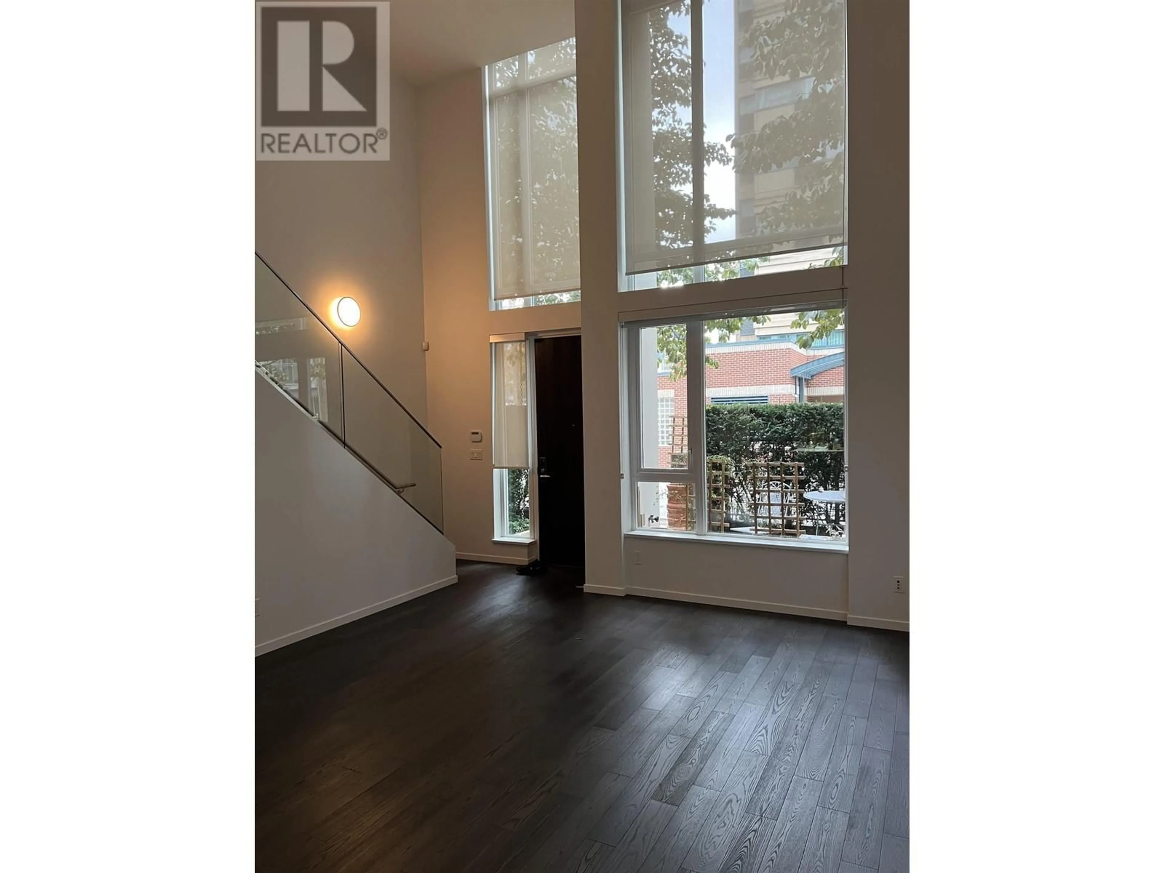 Indoor foyer, wood floors for 1311 CONTINENTAL STREET, Vancouver British Columbia V6Z0C6