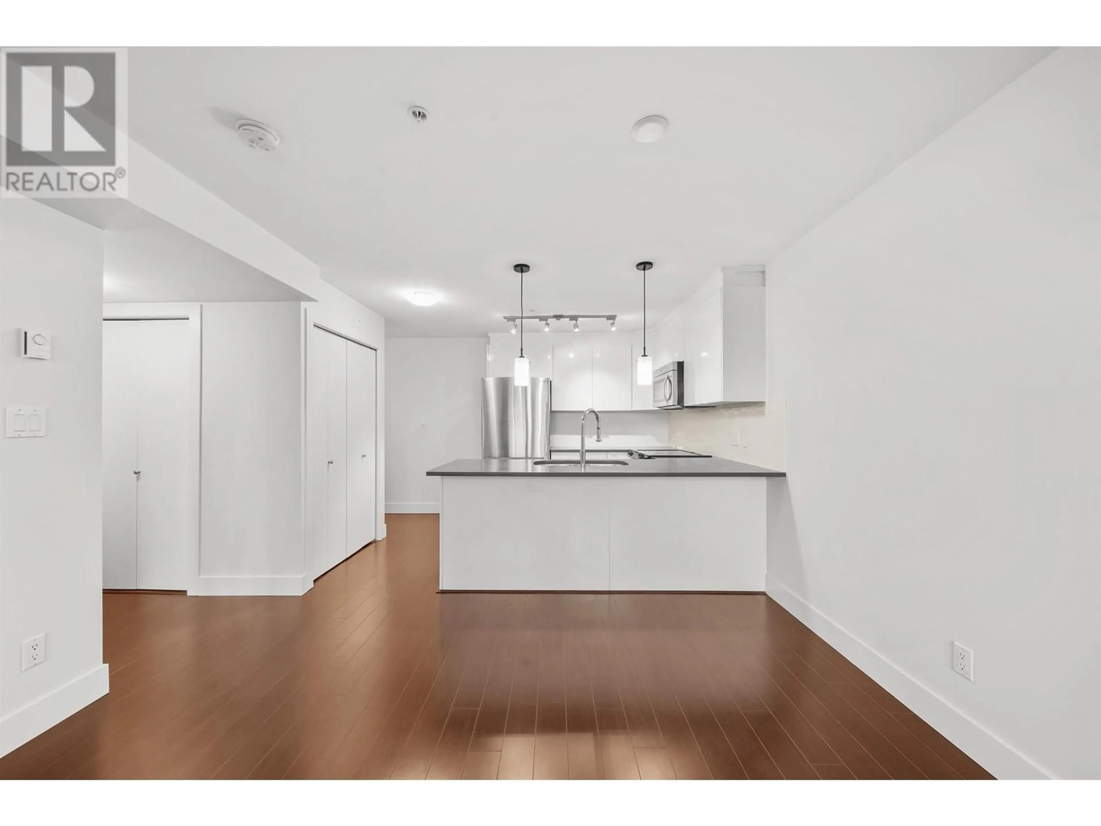 Open concept kitchen for 306 4338 COMMERCIAL STREET, Vancouver British Columbia V5N2S7