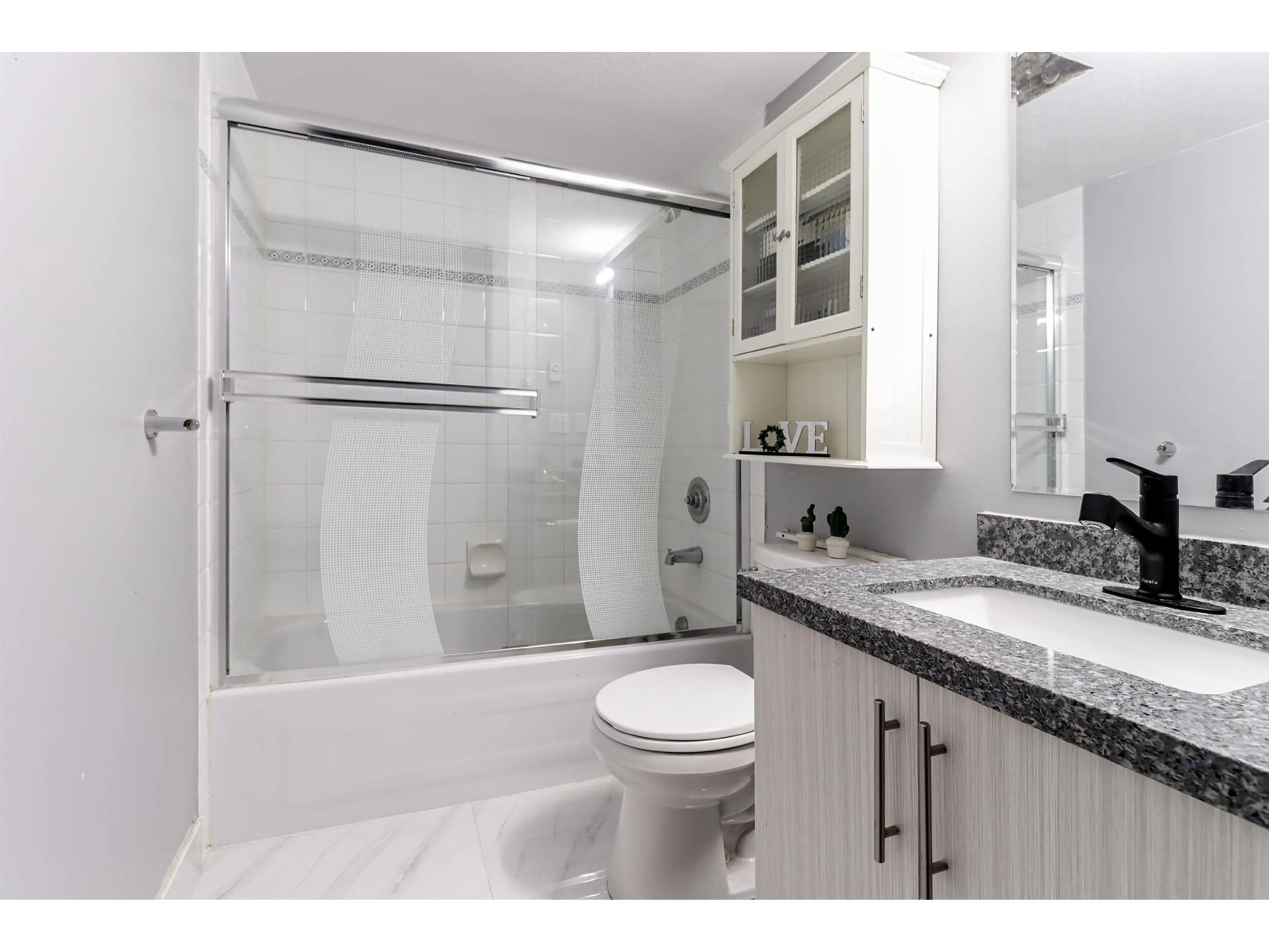 Standard bathroom, ceramic/tile floor for 315 - 8110 120A, Surrey British Columbia V3W3P3