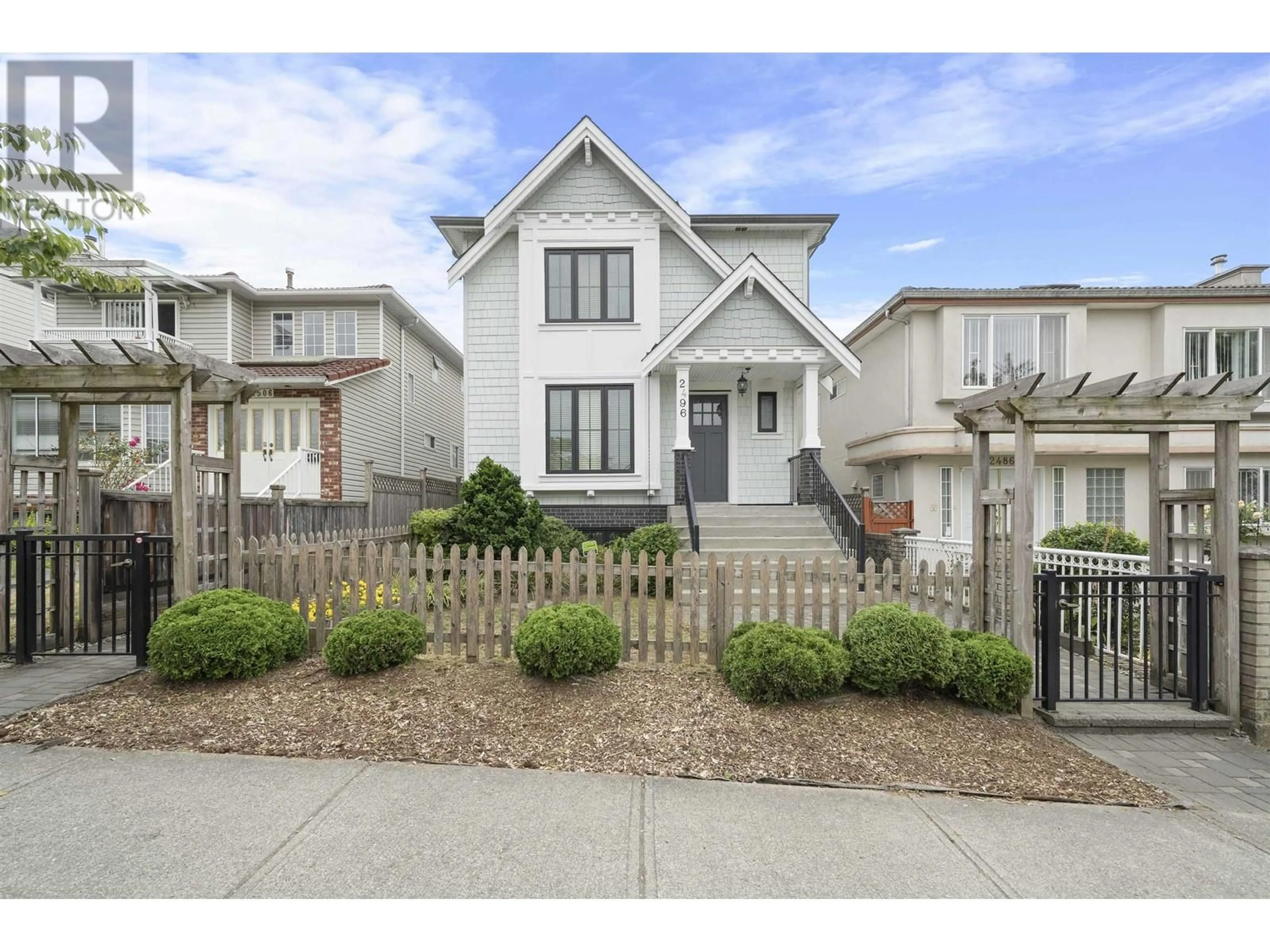 A pic from exterior of the house or condo, the fenced backyard for 2496 BROCK STREET, Vancouver British Columbia V5R2R4