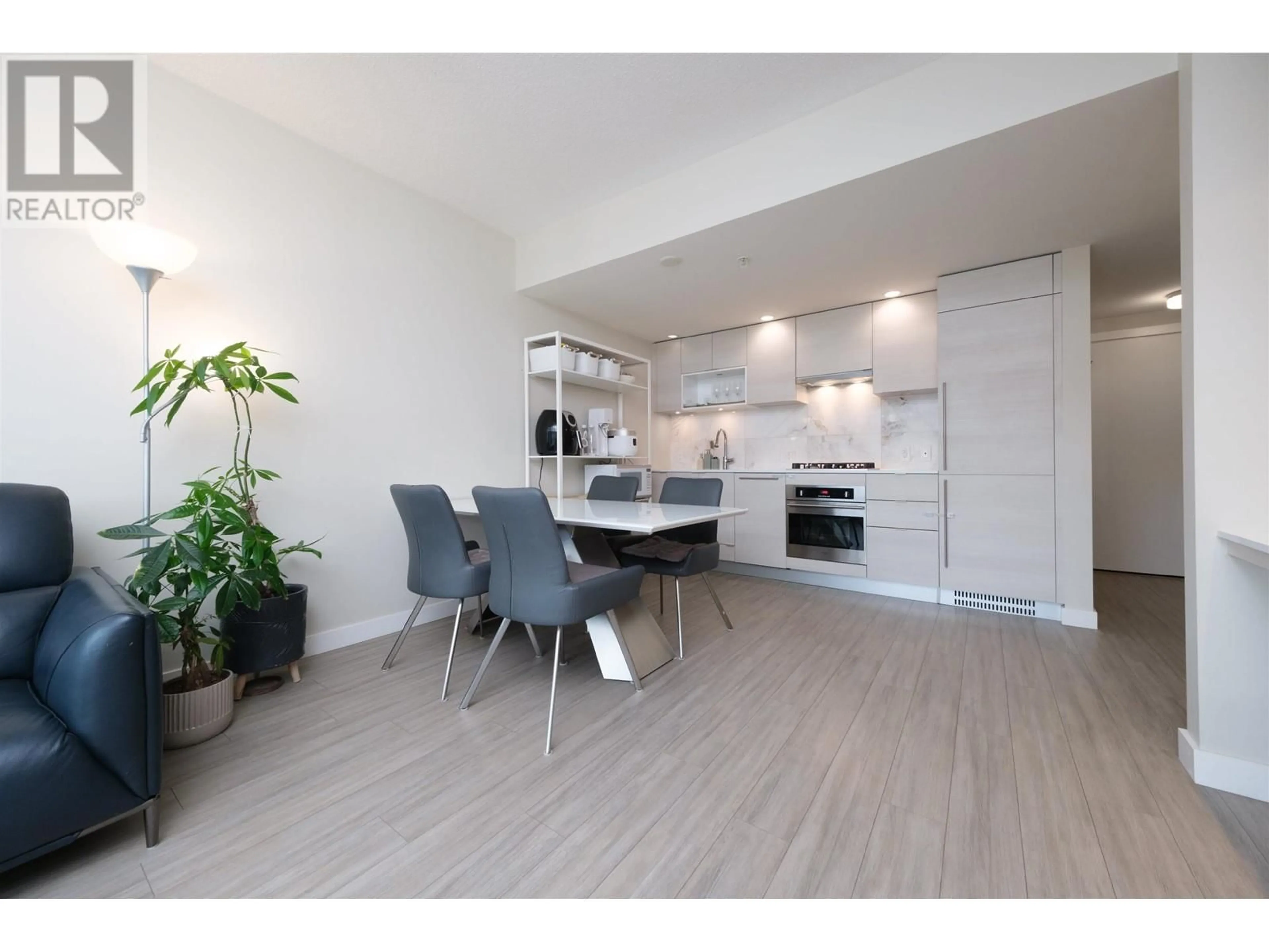 Open concept kitchen for 306 602 COMO LAKE AVENUE, Coquitlam British Columbia V3J0G2