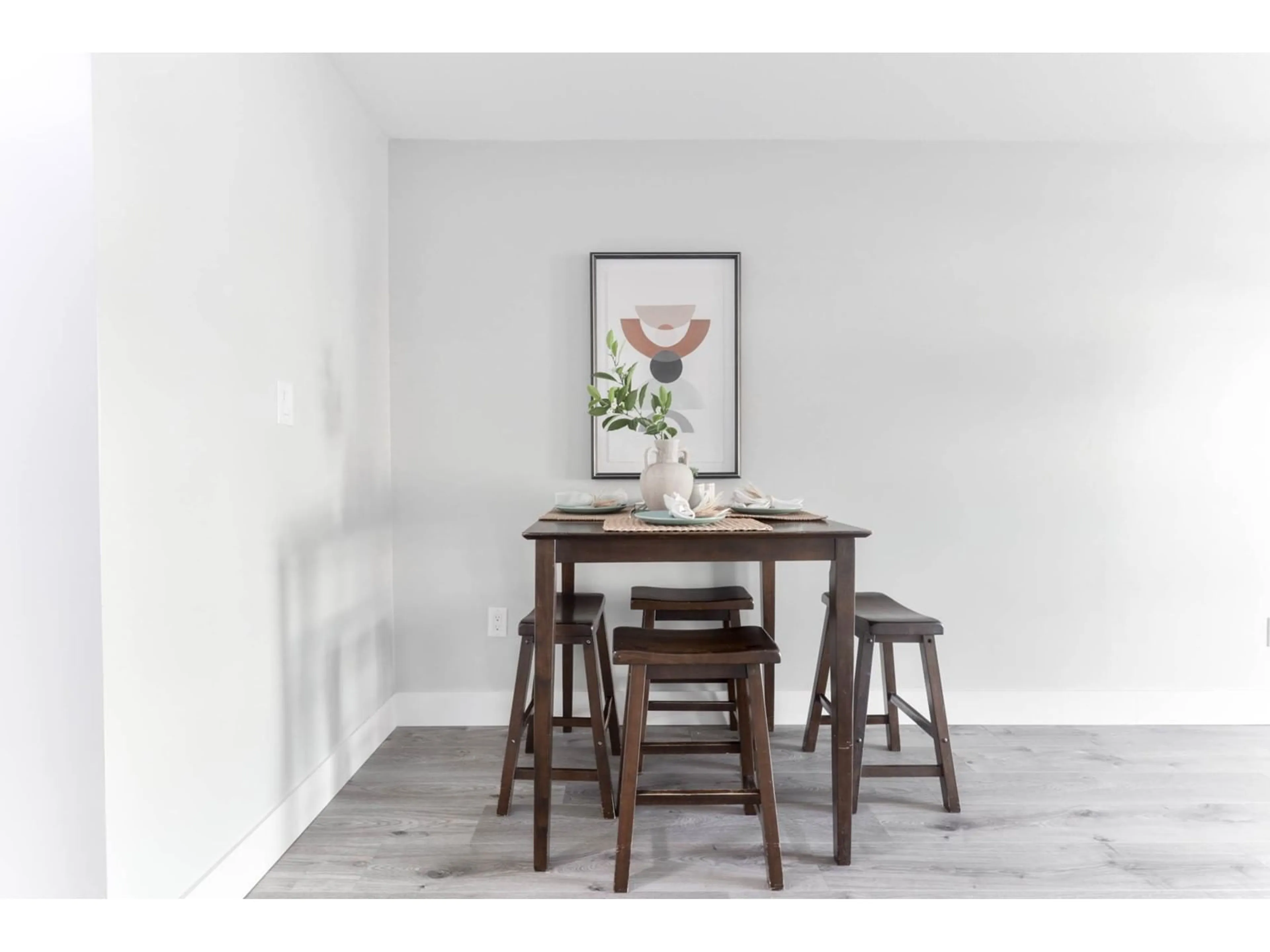 Dining room, wood/laminate floor for 204 33850 FERN STREET, Abbotsford British Columbia V2S6C3