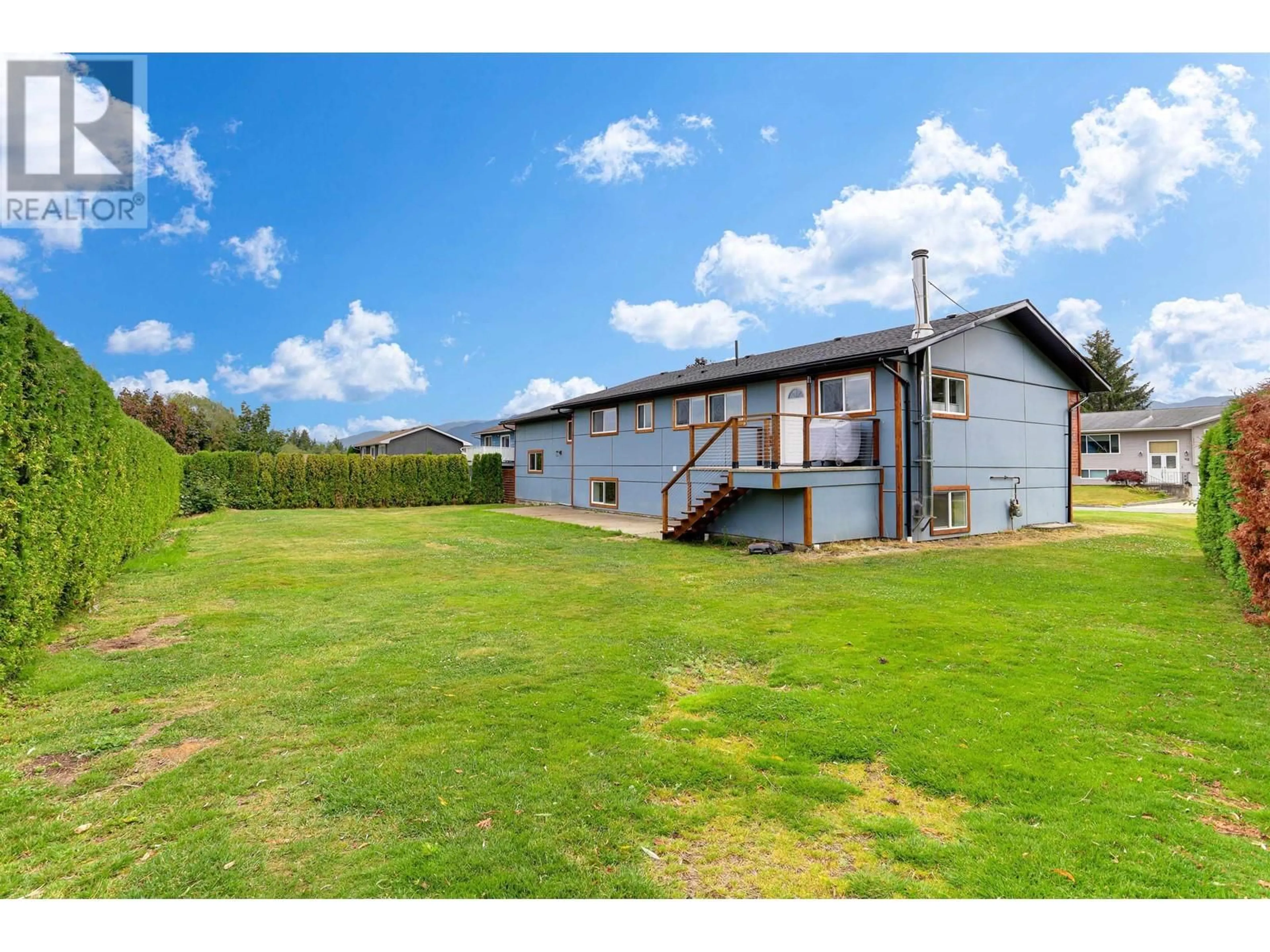 Frontside or backside of a home, the fenced backyard for 39 BRAUN STREET, Kitimat British Columbia V8C2J1