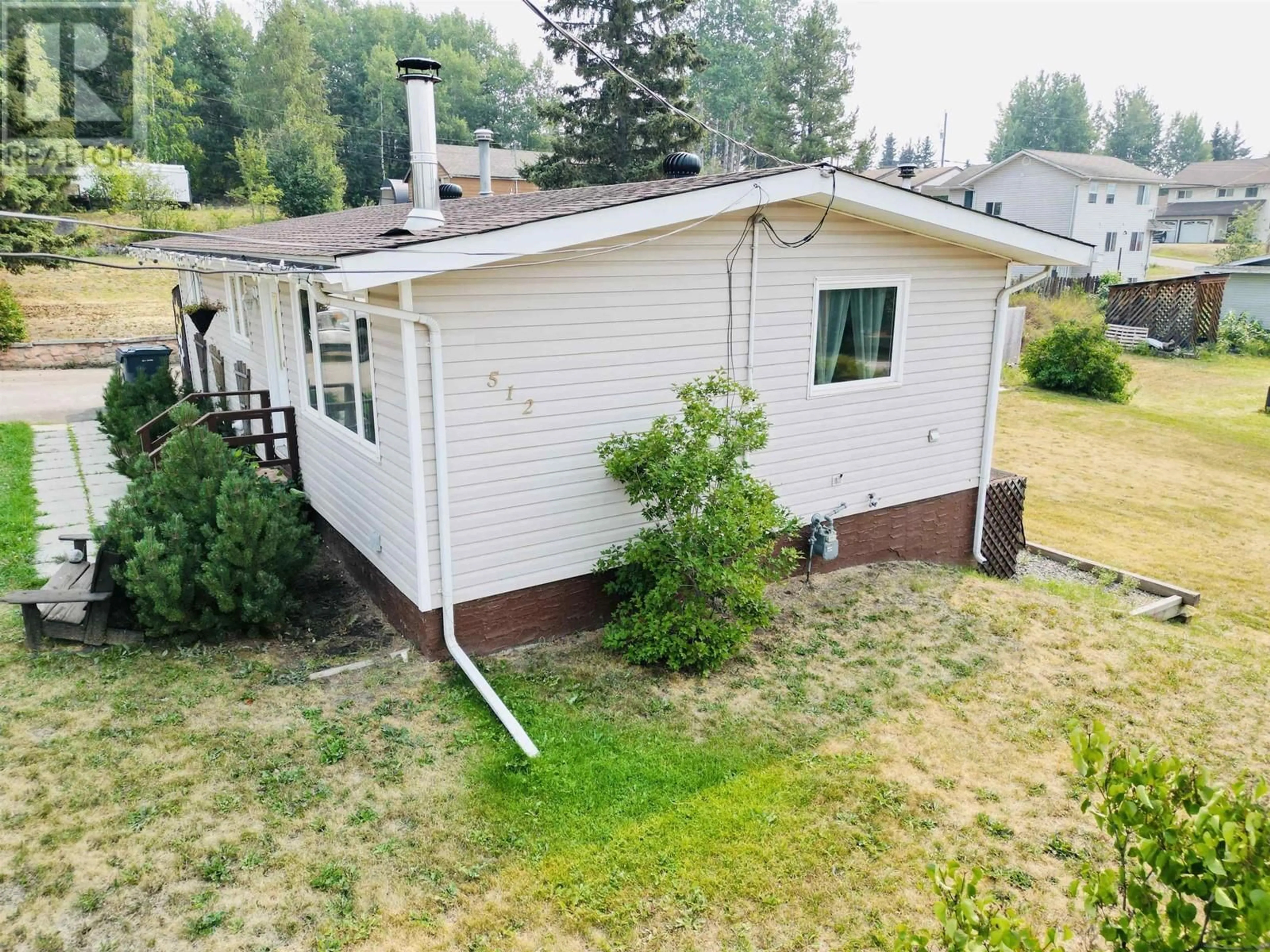 Frontside or backside of a home, cottage for 512 CENTER STREET, Burns Lake British Columbia V0J1E0