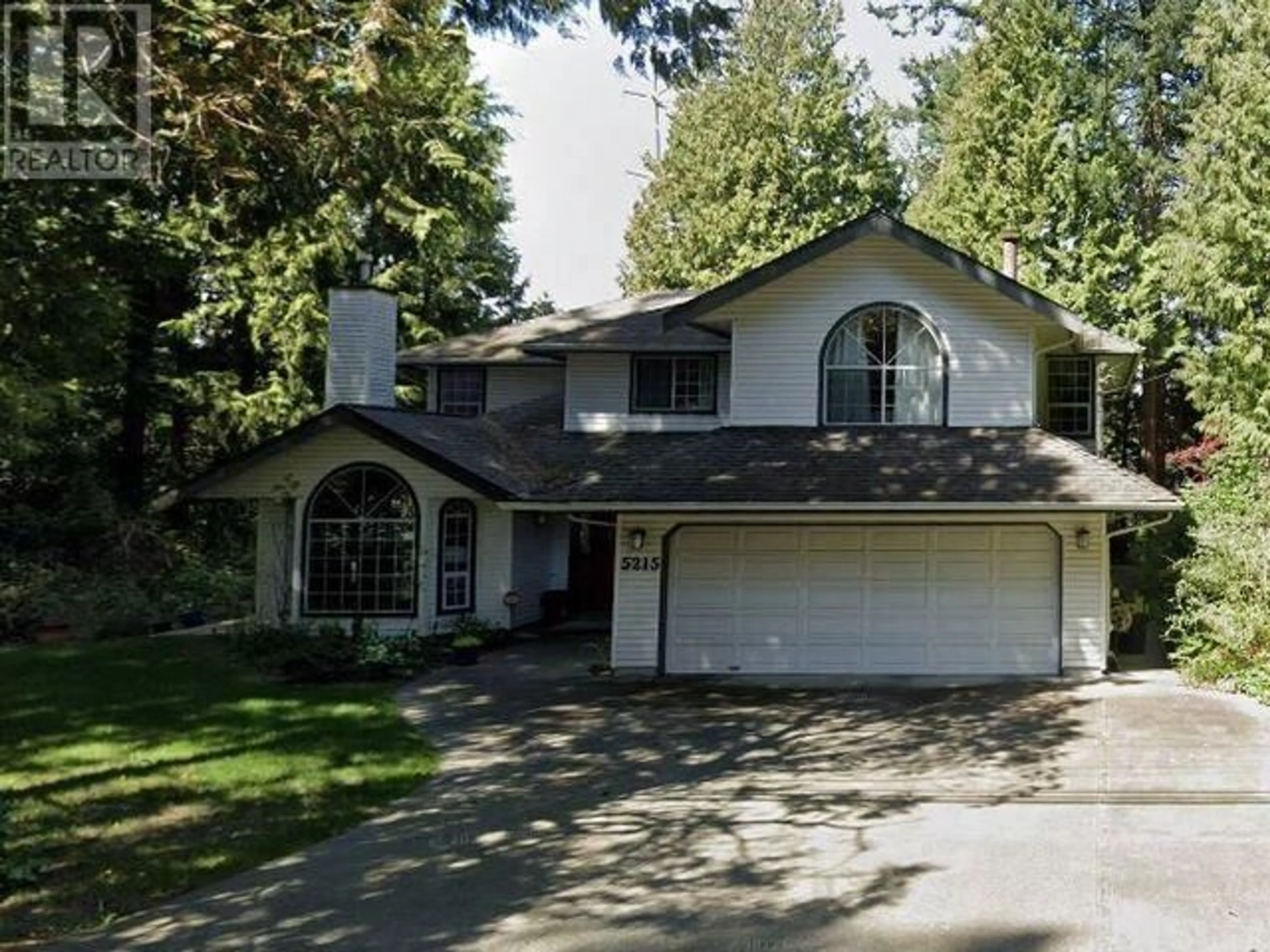 Frontside or backside of a home, the street view for 5215 6 AVENUE, Delta British Columbia V4M1L6