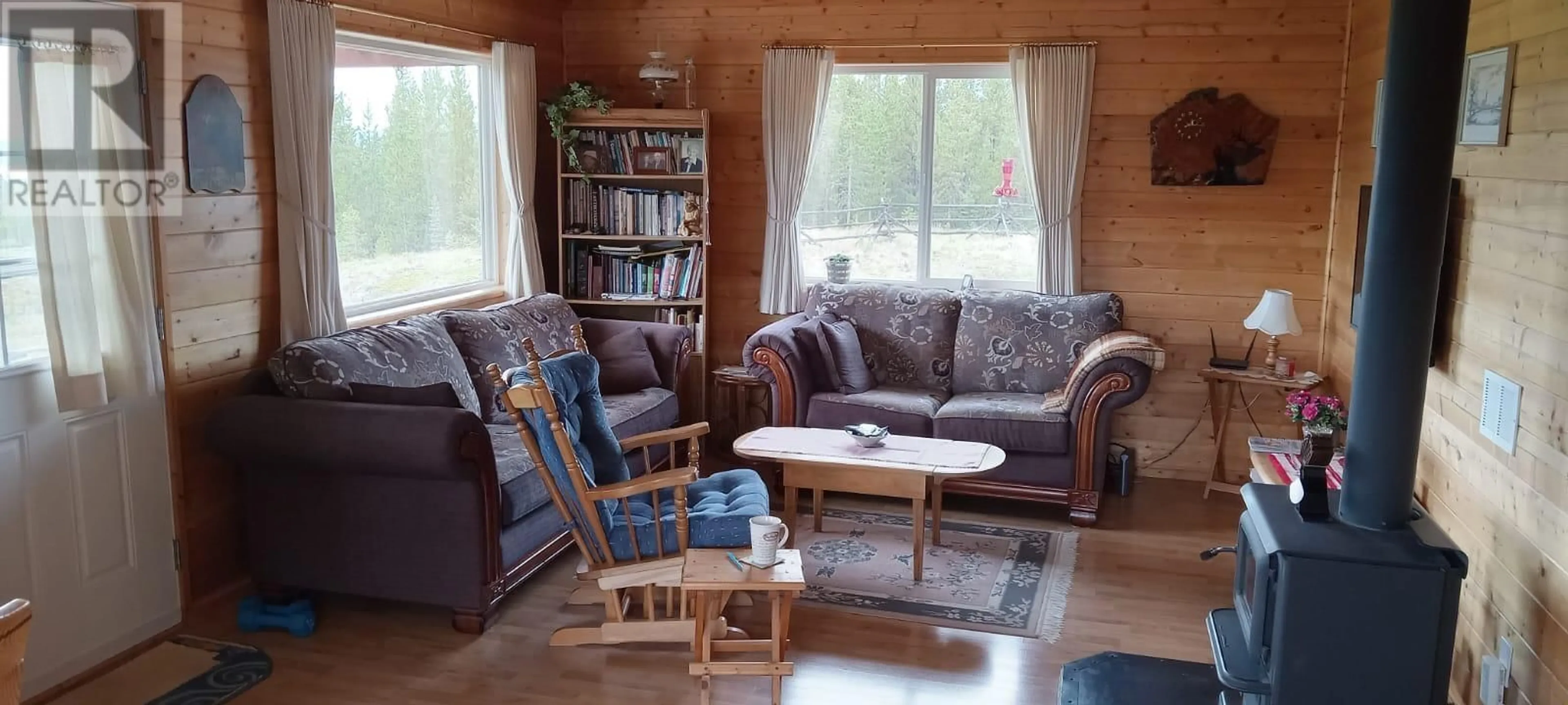 Living room with furniture, wood/laminate floor for 18775 CHILCOTIN 20 HIGHWAY, Williams Lake British Columbia V0L1M0