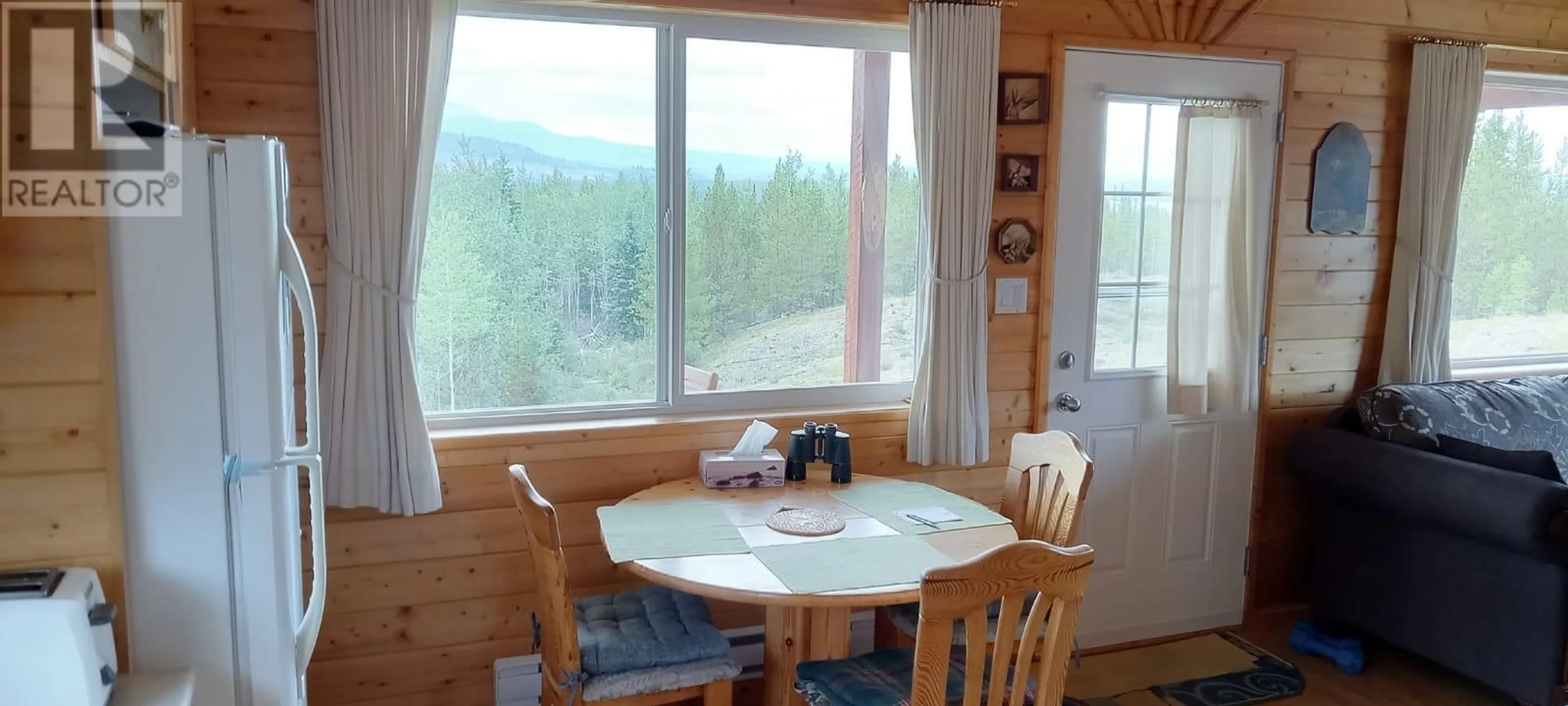 Dining room, wood/laminate floor for 18775 CHILCOTIN 20 HIGHWAY, Williams Lake British Columbia V0L1M0