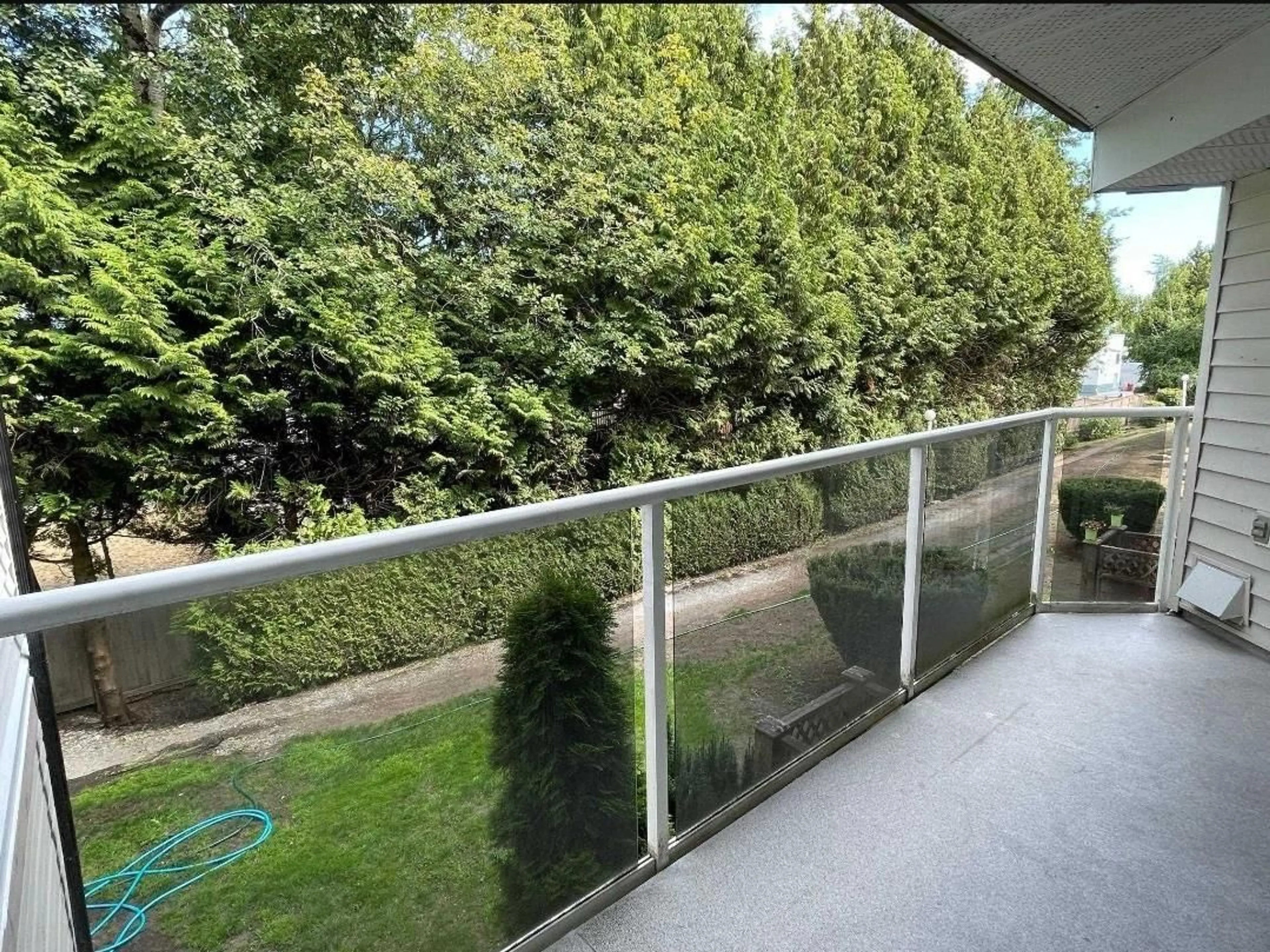 Balcony in the apartment, the fenced backyard for 207 12739 72 AVENUE, Surrey British Columbia V3W4E8