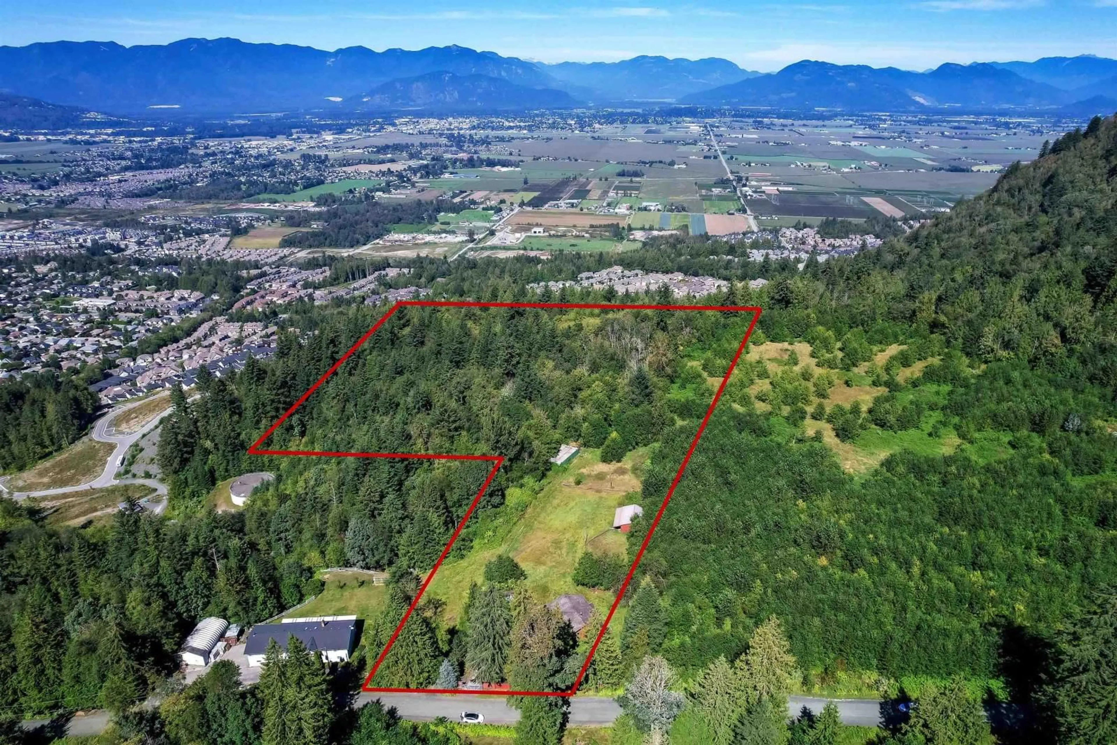 A pic from outside/outdoor area/front of a property/back of a property/a pic from drone, mountain view for 47015 EXTROM ROAD, Chilliwack British Columbia V2R4V1