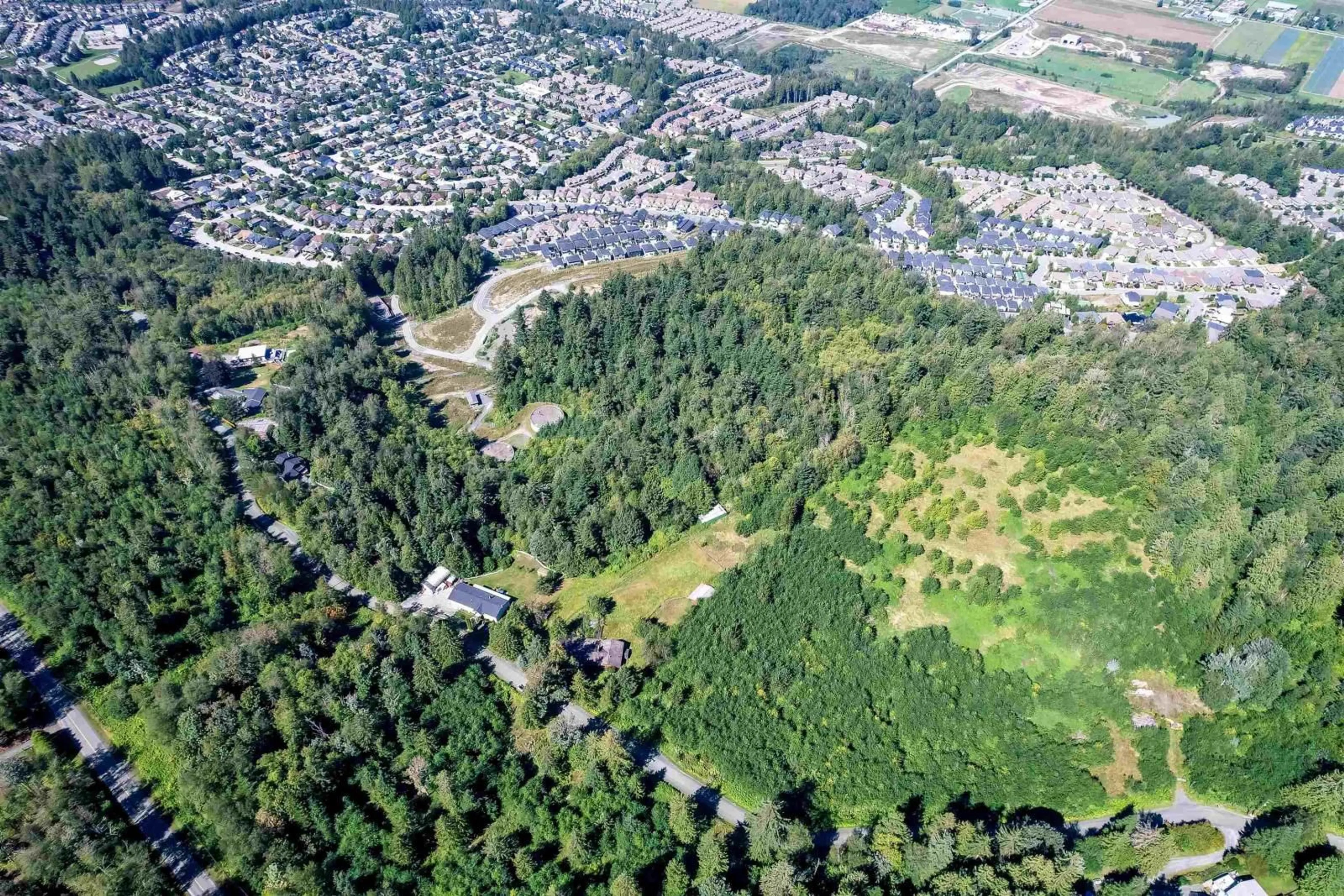 A pic from outside/outdoor area/front of a property/back of a property/a pic from drone, forest/trees view for 47015 EXTROM ROAD, Chilliwack British Columbia V2R4V1