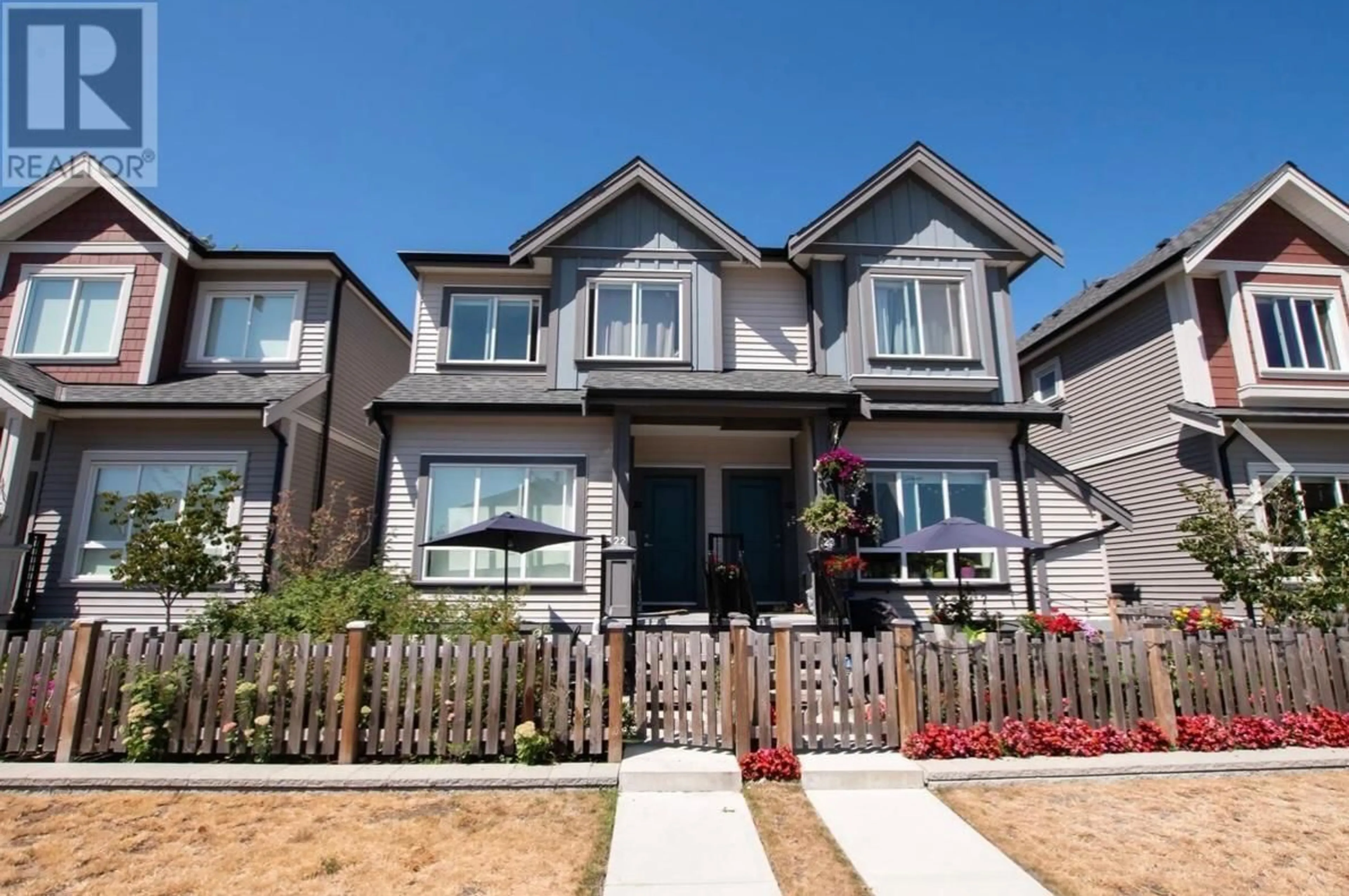 Frontside or backside of a home, the fenced backyard for 22 22600 GILLEY ROAD, Richmond British Columbia V6V1E4