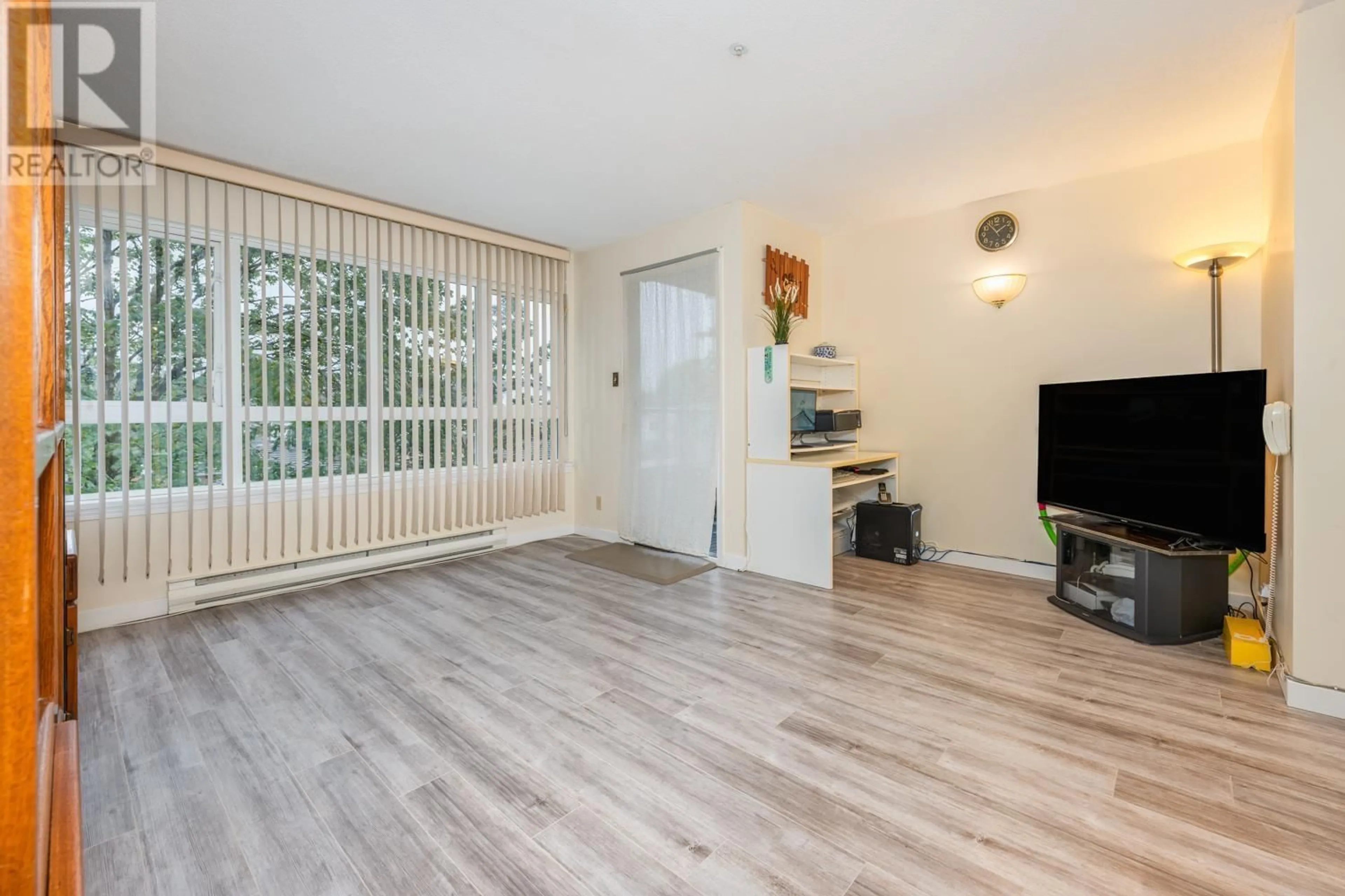 A pic of a room, wood floors for 307 4950 MCGEER STREET, Vancouver British Columbia V5R6B4