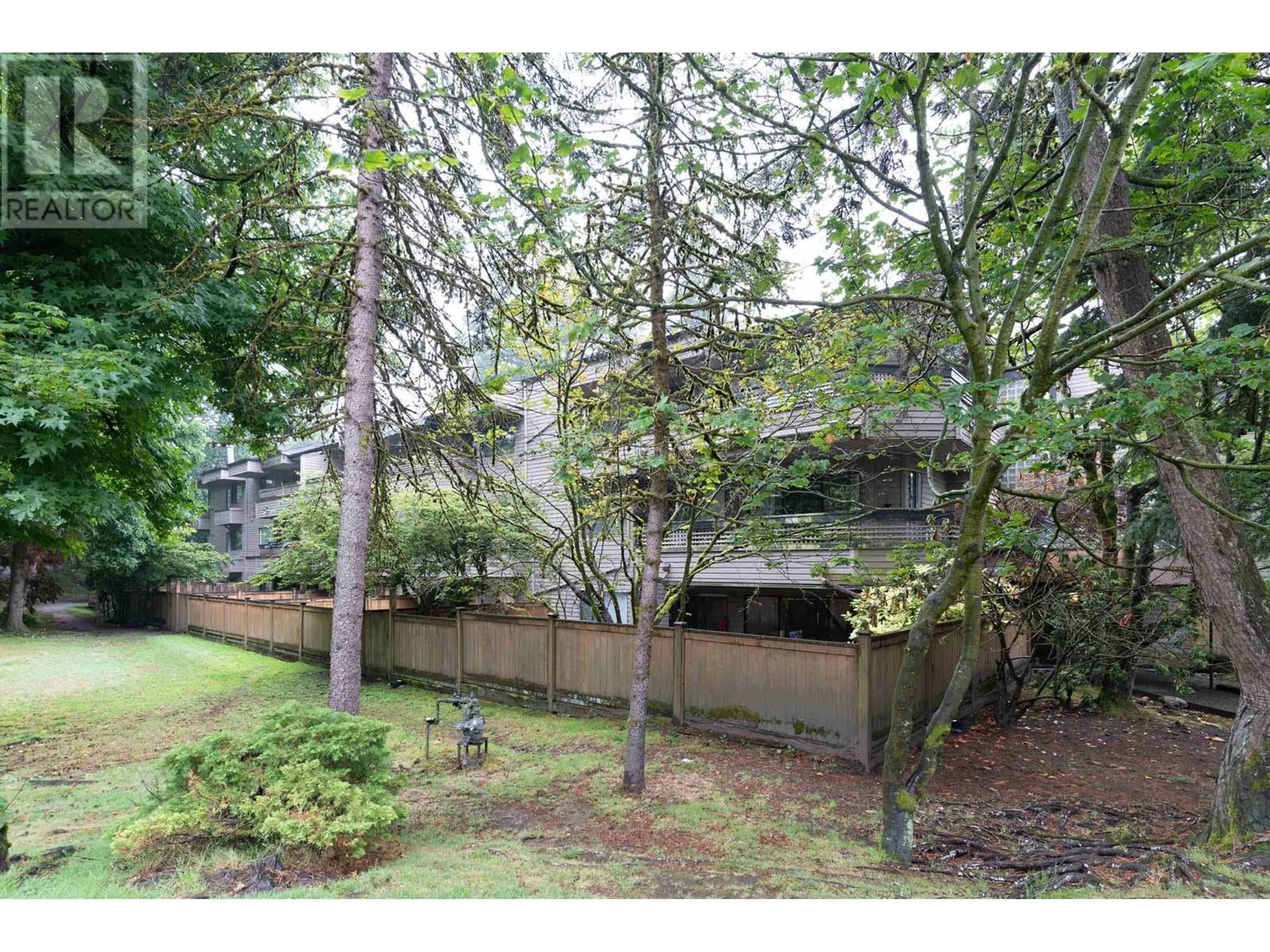 A pic from exterior of the house or condo, the fenced backyard for 310 1195 PIPELINE ROAD, Coquitlam British Columbia V3B6J5