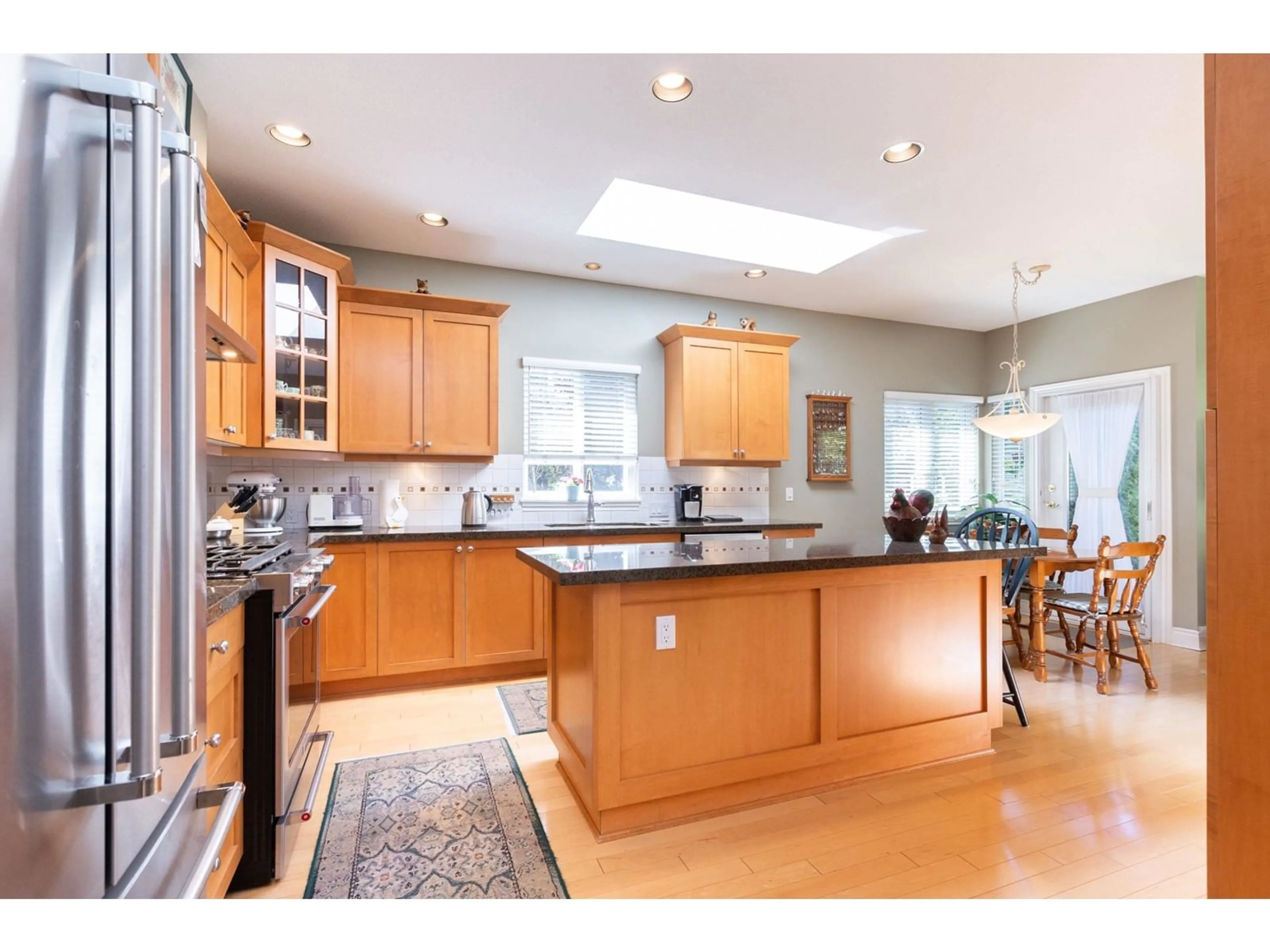 Open concept kitchen for 51 3355 MORGAN CREEK WAY, Surrey British Columbia V3Z0J9